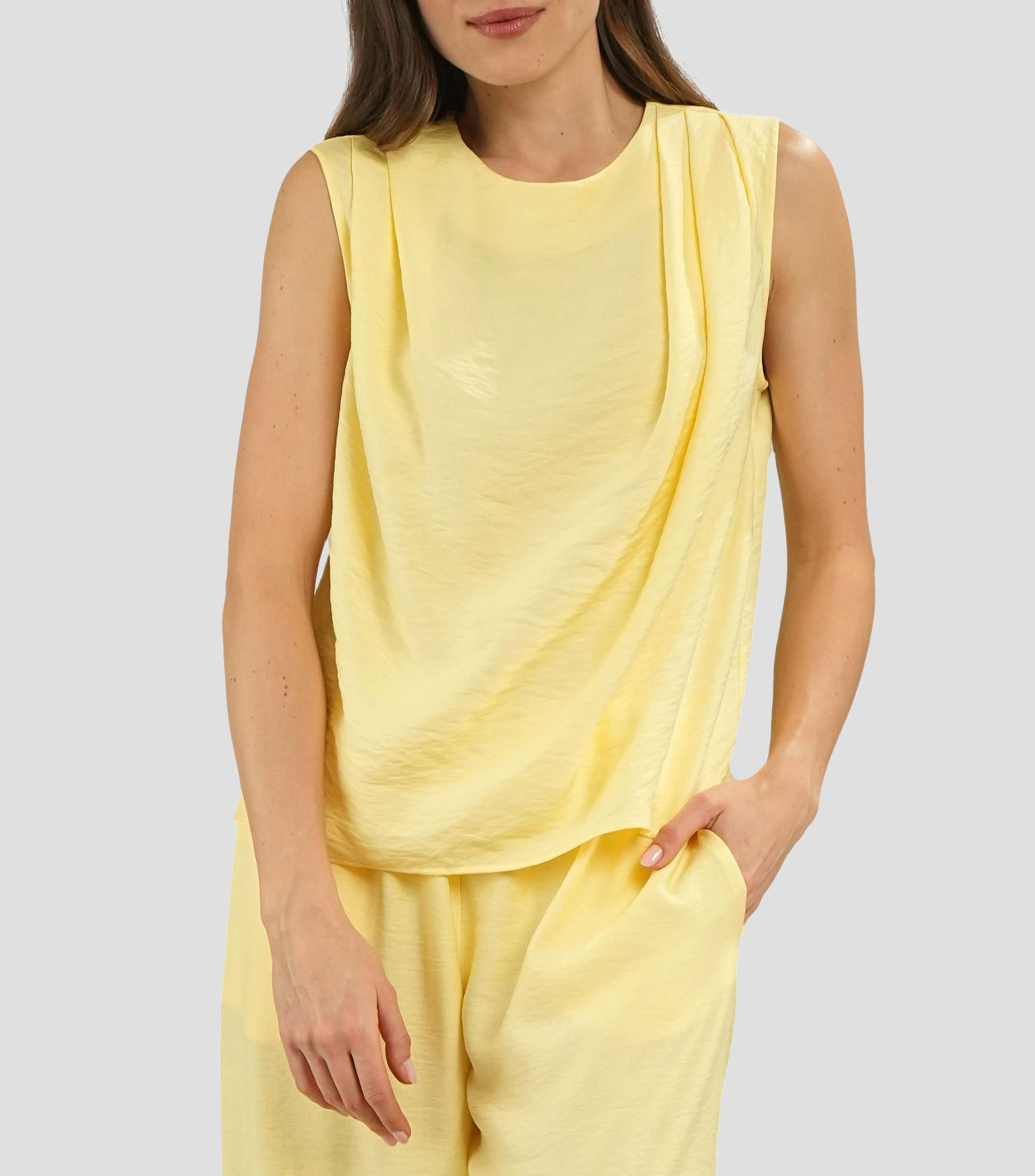 Blusa lisa sin mangas Mujer