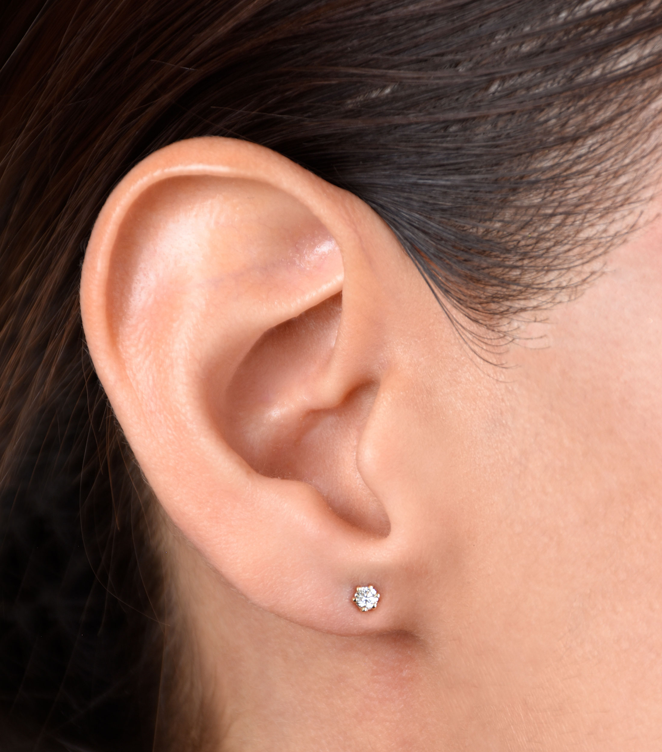 Broqueles en oro amarillo de 18 kilates con diamante Mujer