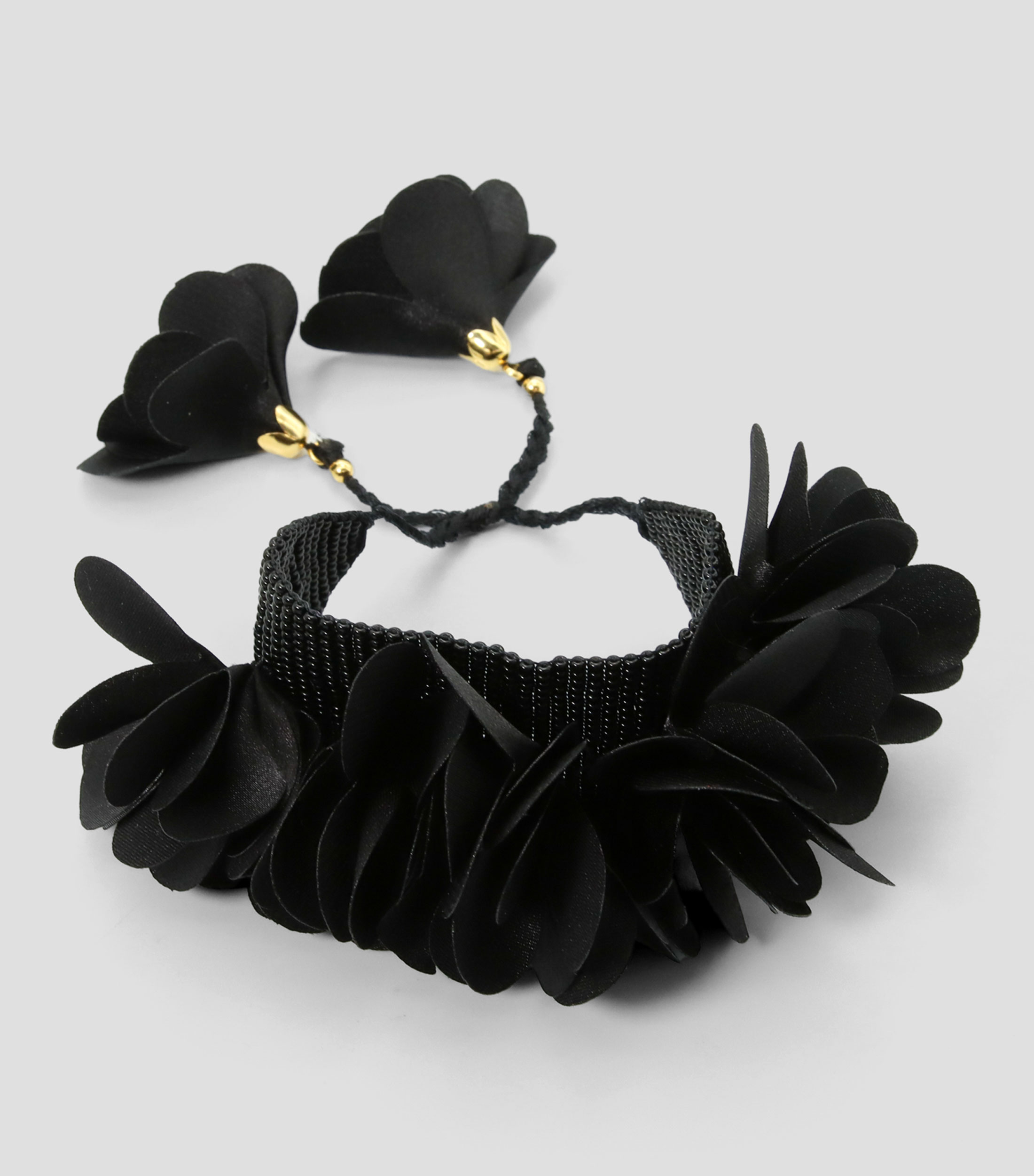 Pulsera ajustable negra con flores Mujer