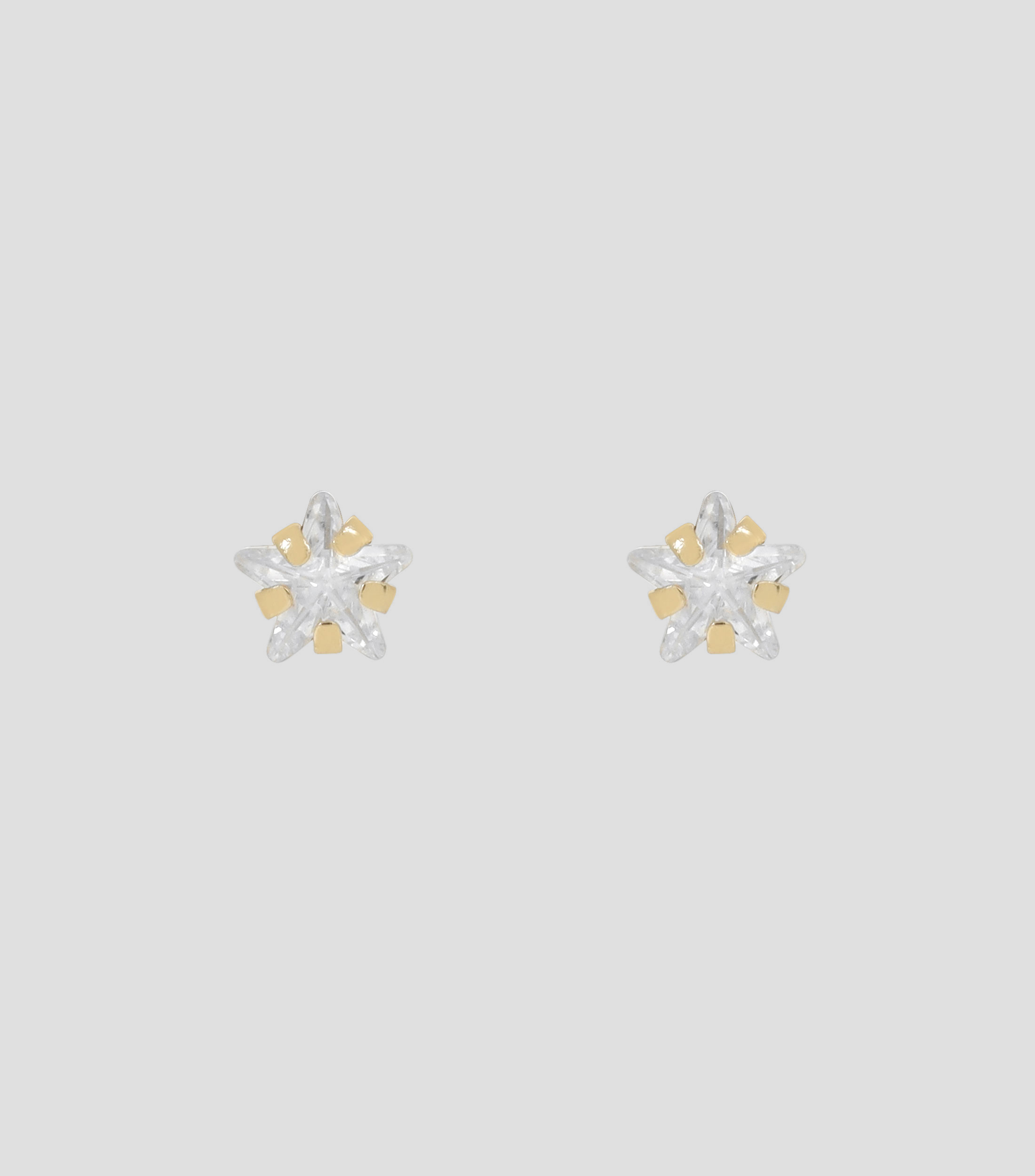 Aretes en oro amarillo de 10 kilates con estrella montada de circonias Niña