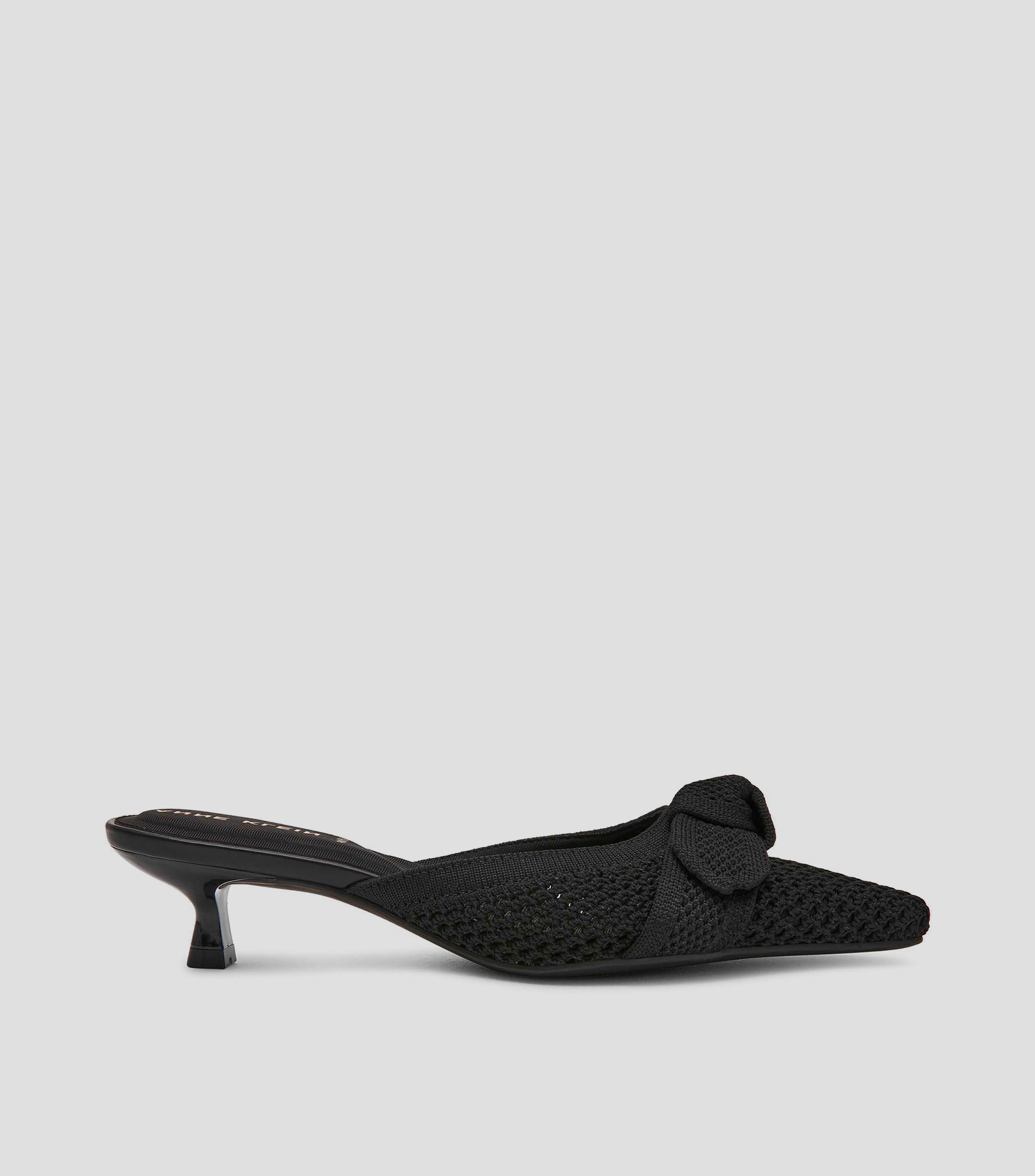 Zapatillas con tacón bajo de aguja Mujer