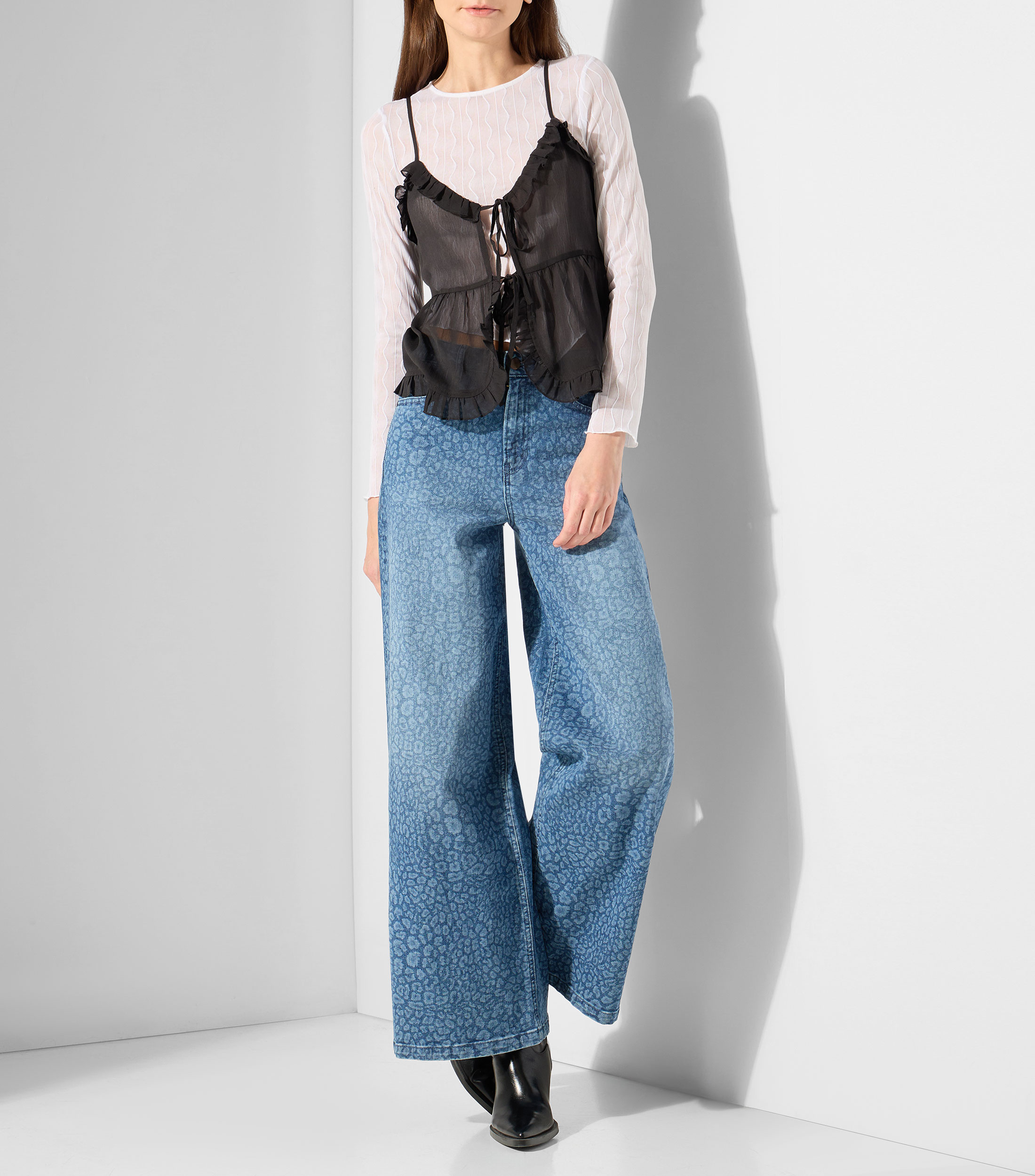 Blusa lisa sin mangas Mujer