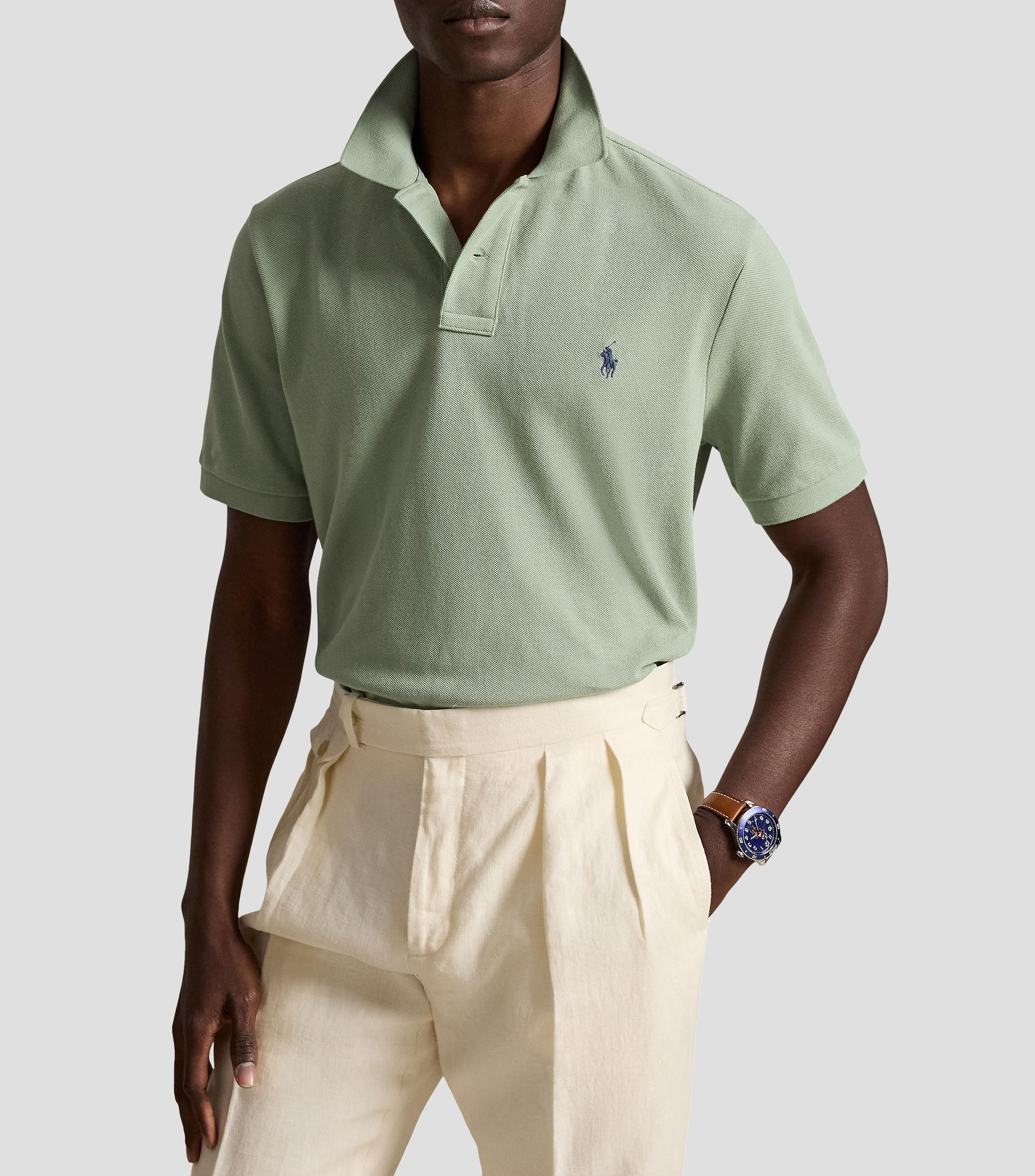 Playera tipo polo con manga corta lisa Hombre