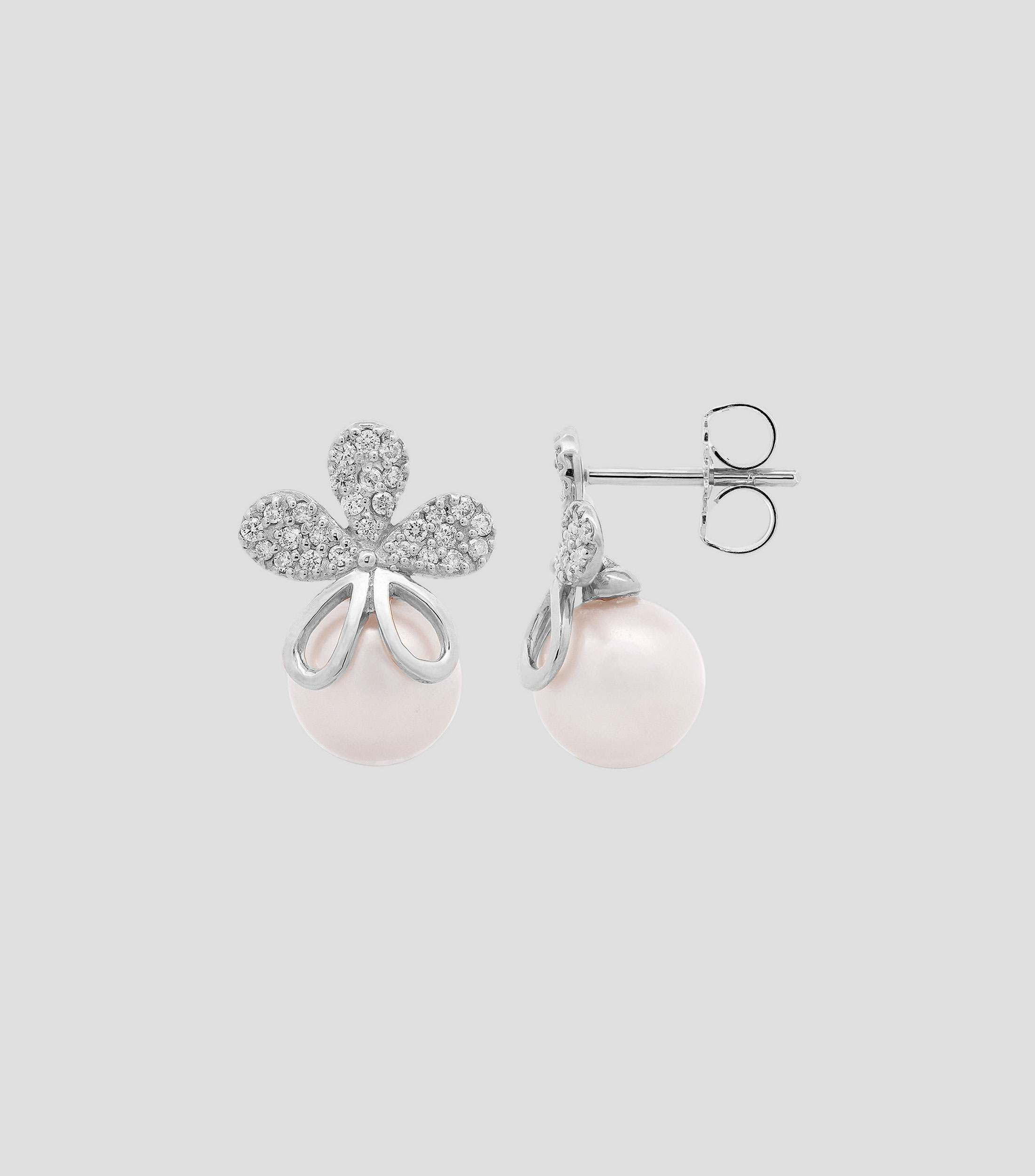 Aretes en oro blanco de 14 kilates con perla Mujer