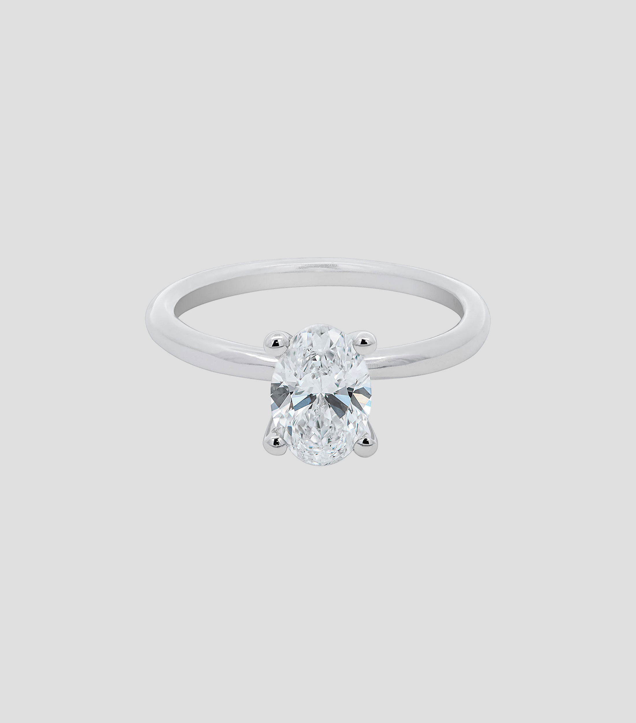 Anillo solitario en oro blanco de 14 kilates Mujer