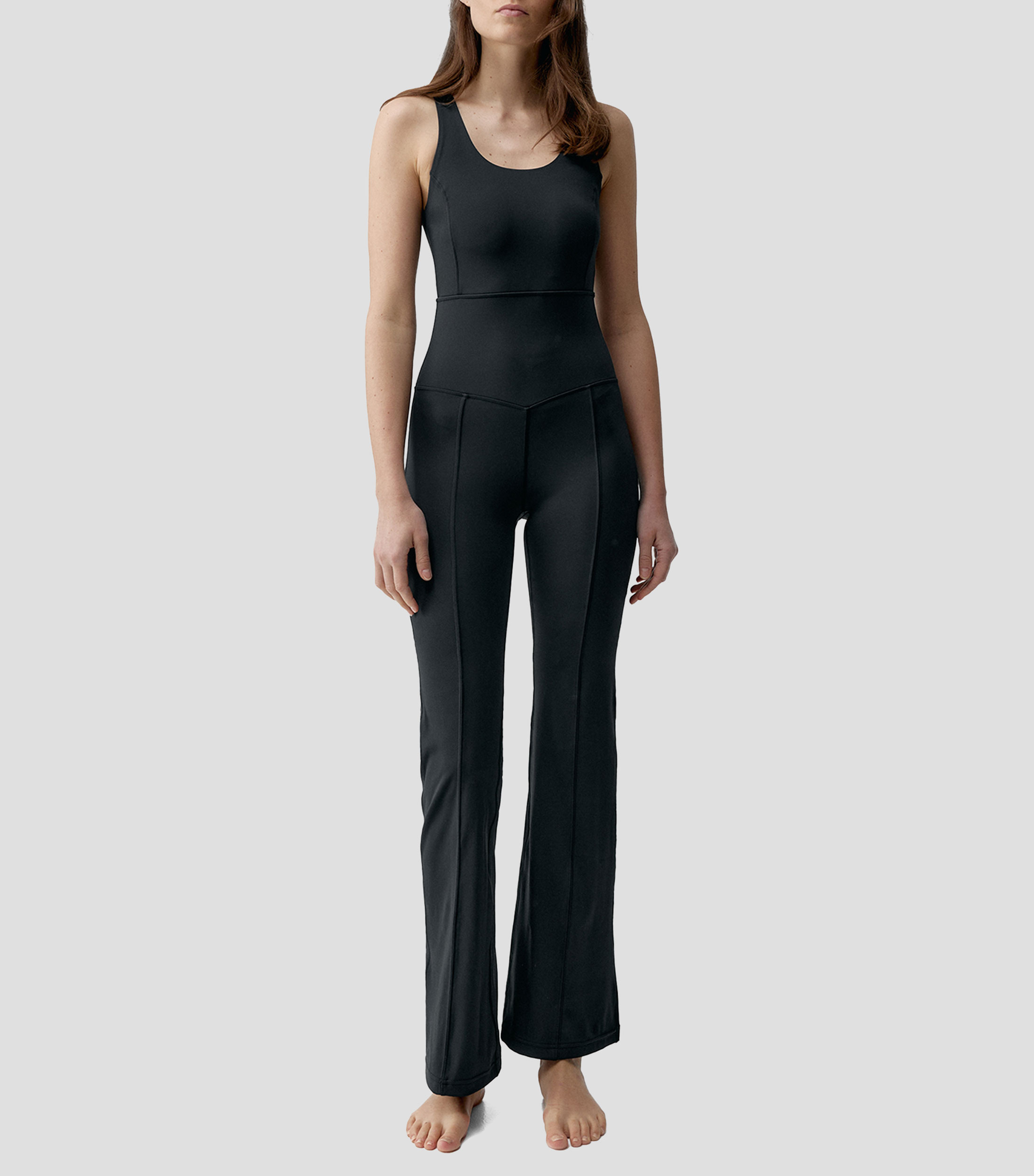 Jumpsuit para entrenamiento de corte flared Mujer