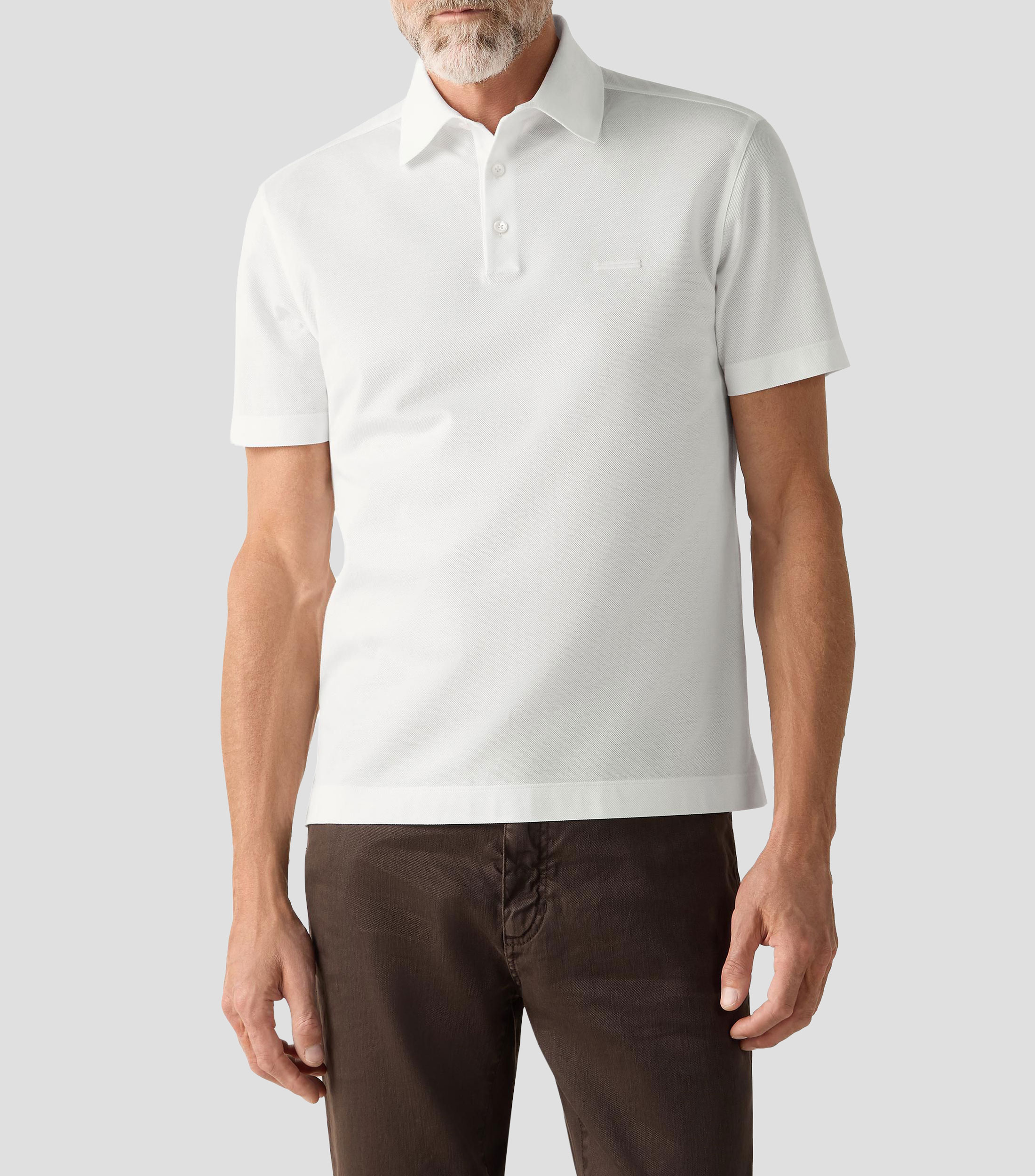 Playera tipo polo con manga corta lisa Hombre