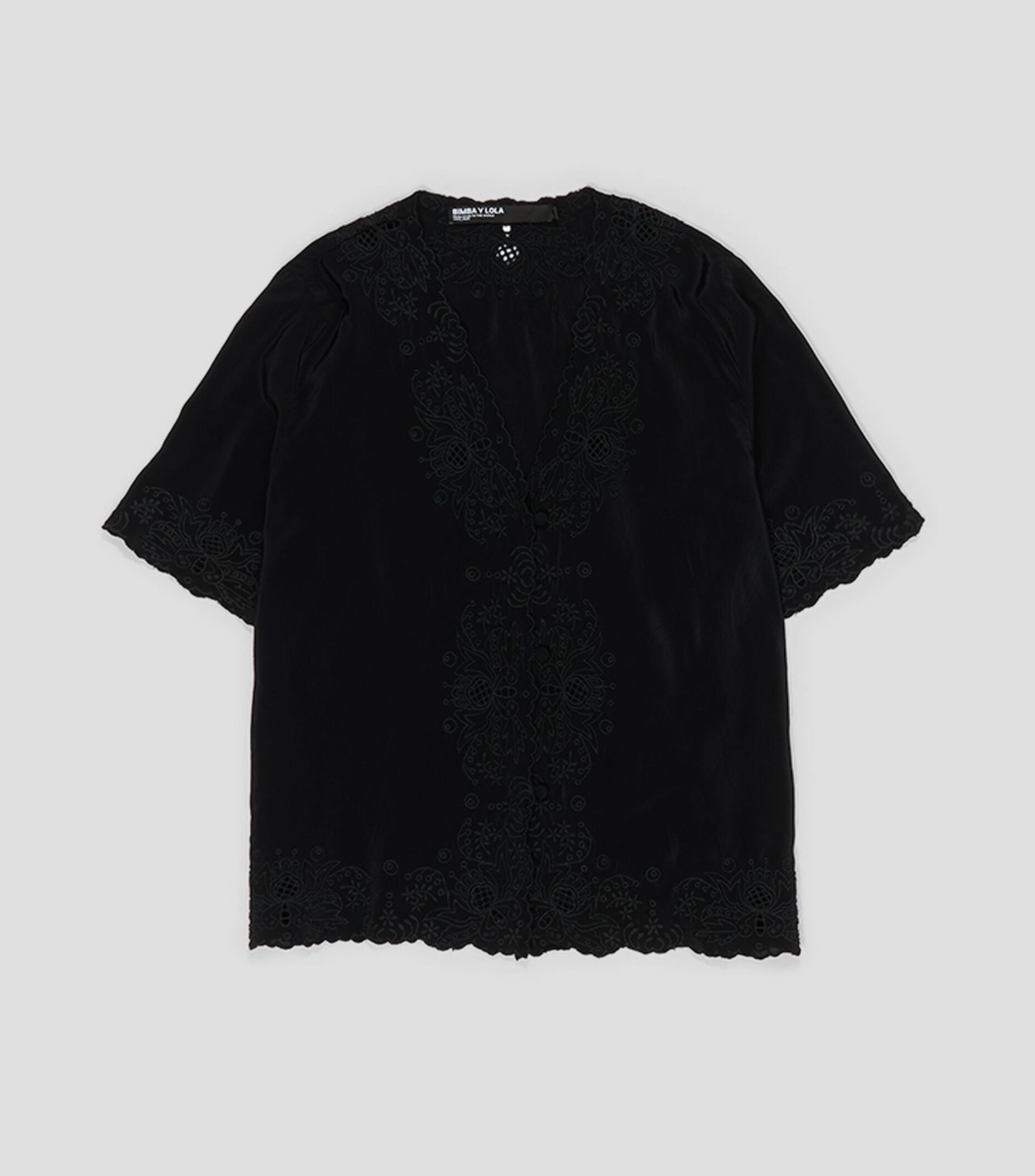Blusa bordados negra Mujer