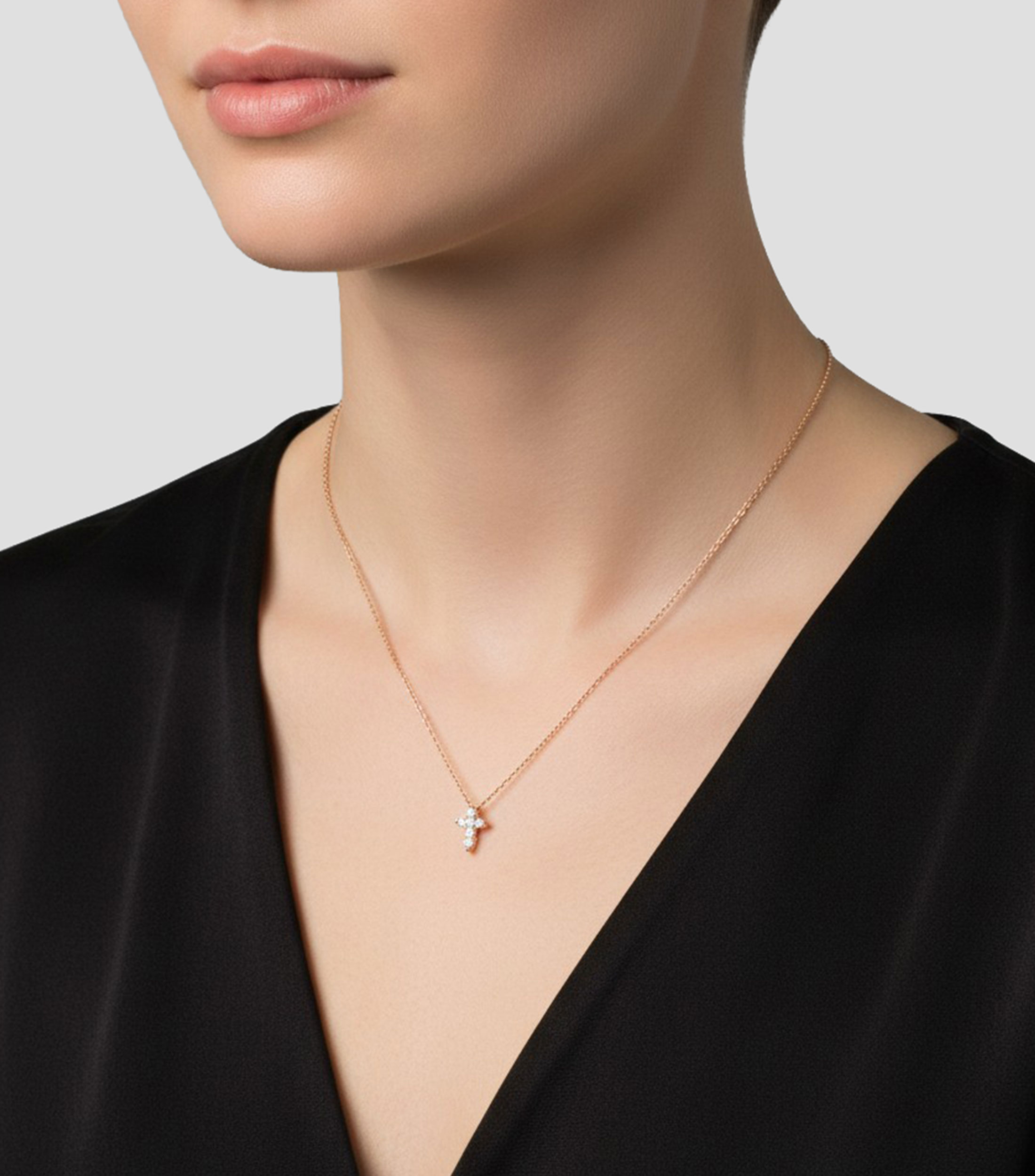 Collar en Oro rosa con dije de cruz Mujer