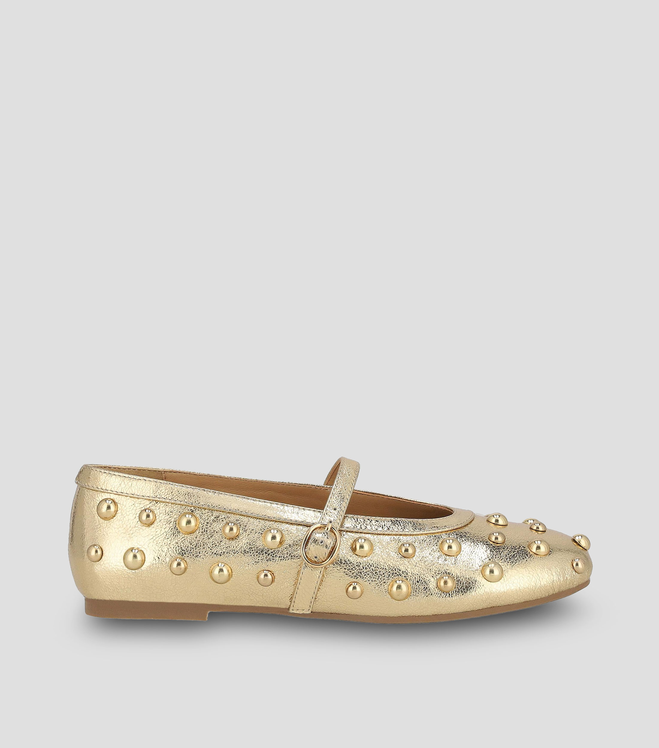 Flats en piel con tacón media luna y estoperol Mujer