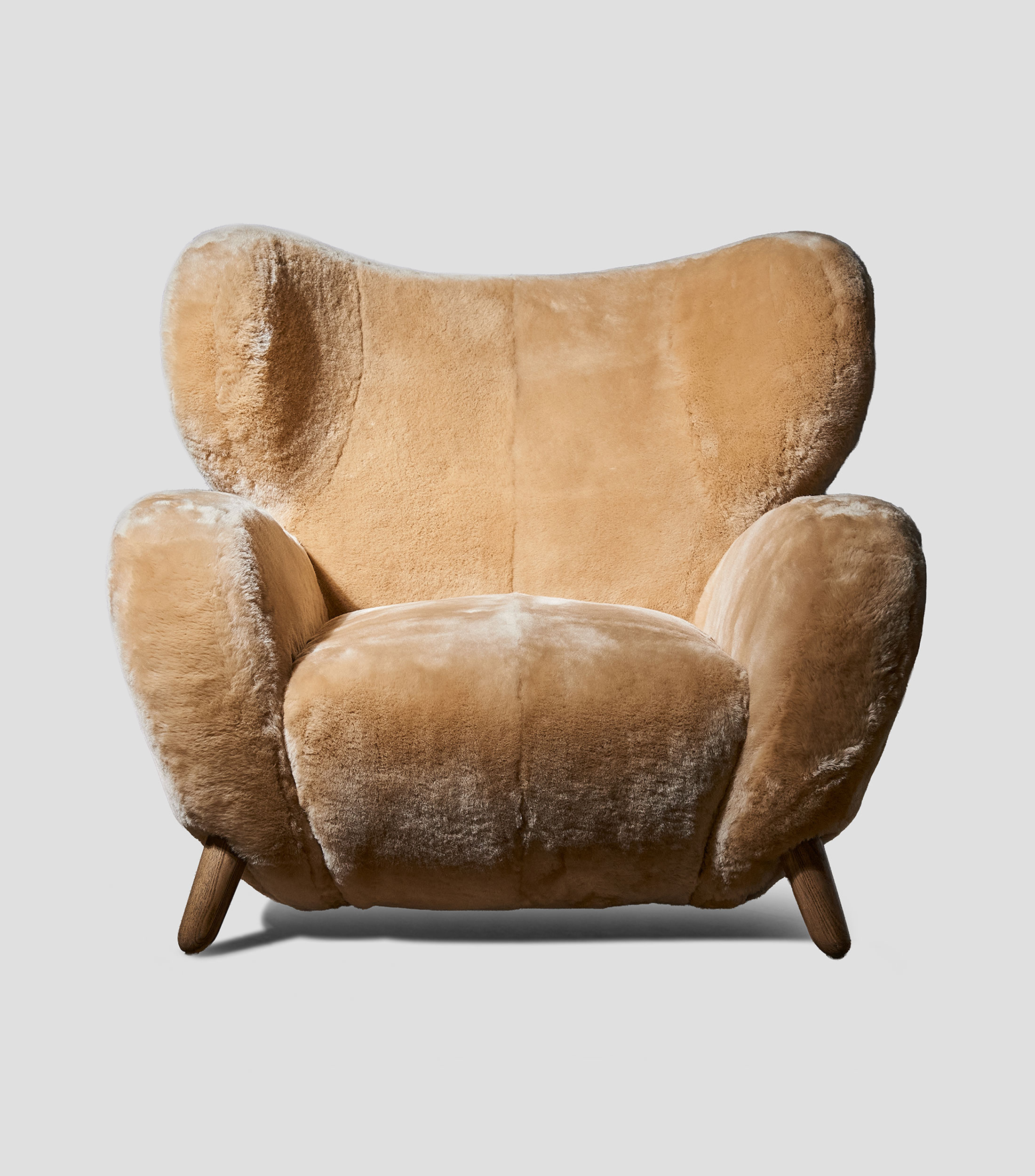 Sillón en piel de oveja Manx arena
