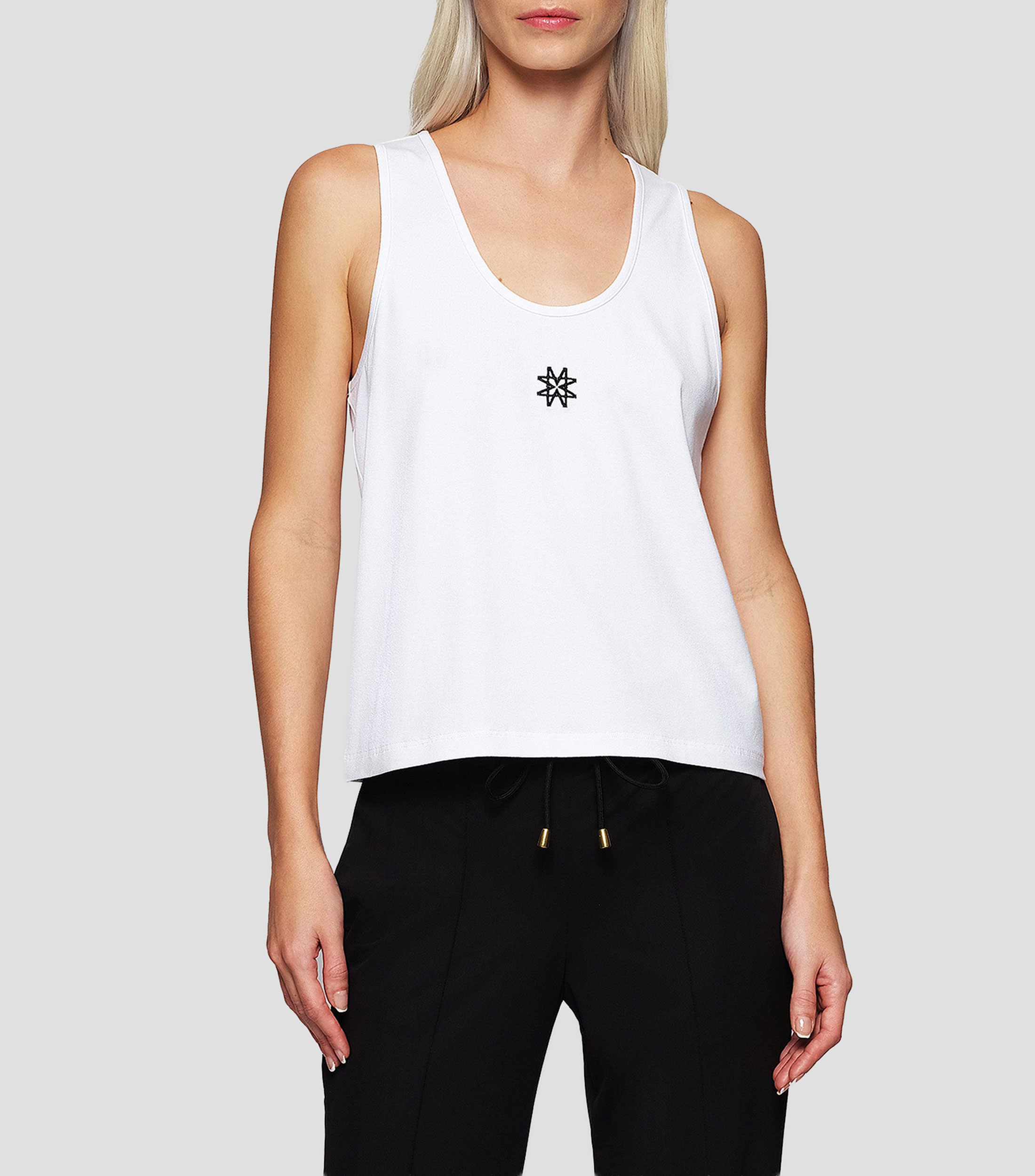 Blusa lisa sin mangas Mujer