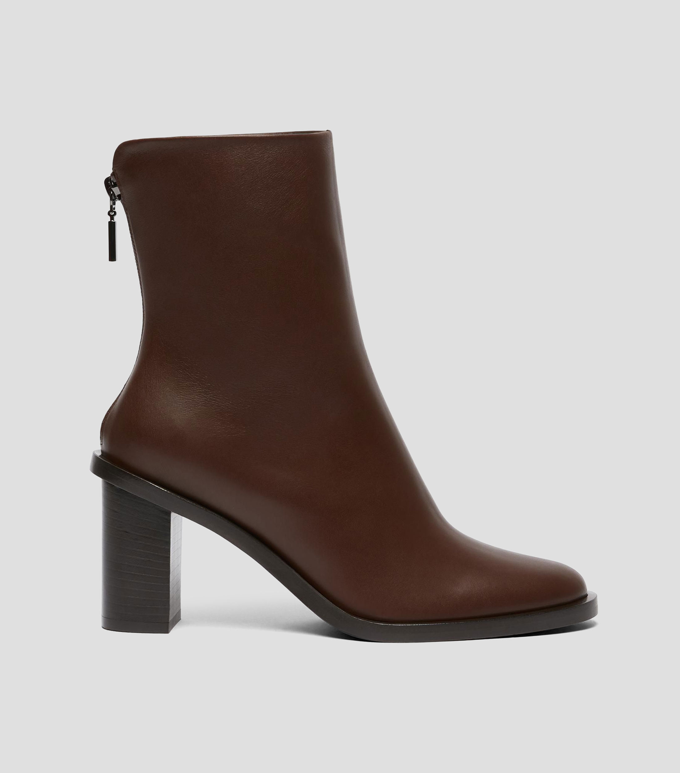 Botas vaqueras medias en piel con tacón alto cuadrado Mujer