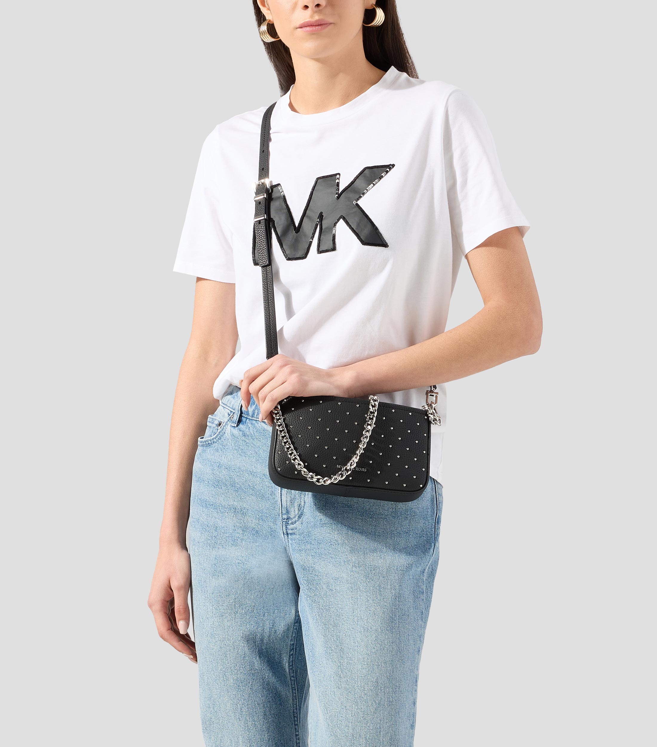 Bolsa crossbody Pouchette en piel con remaches Mujer