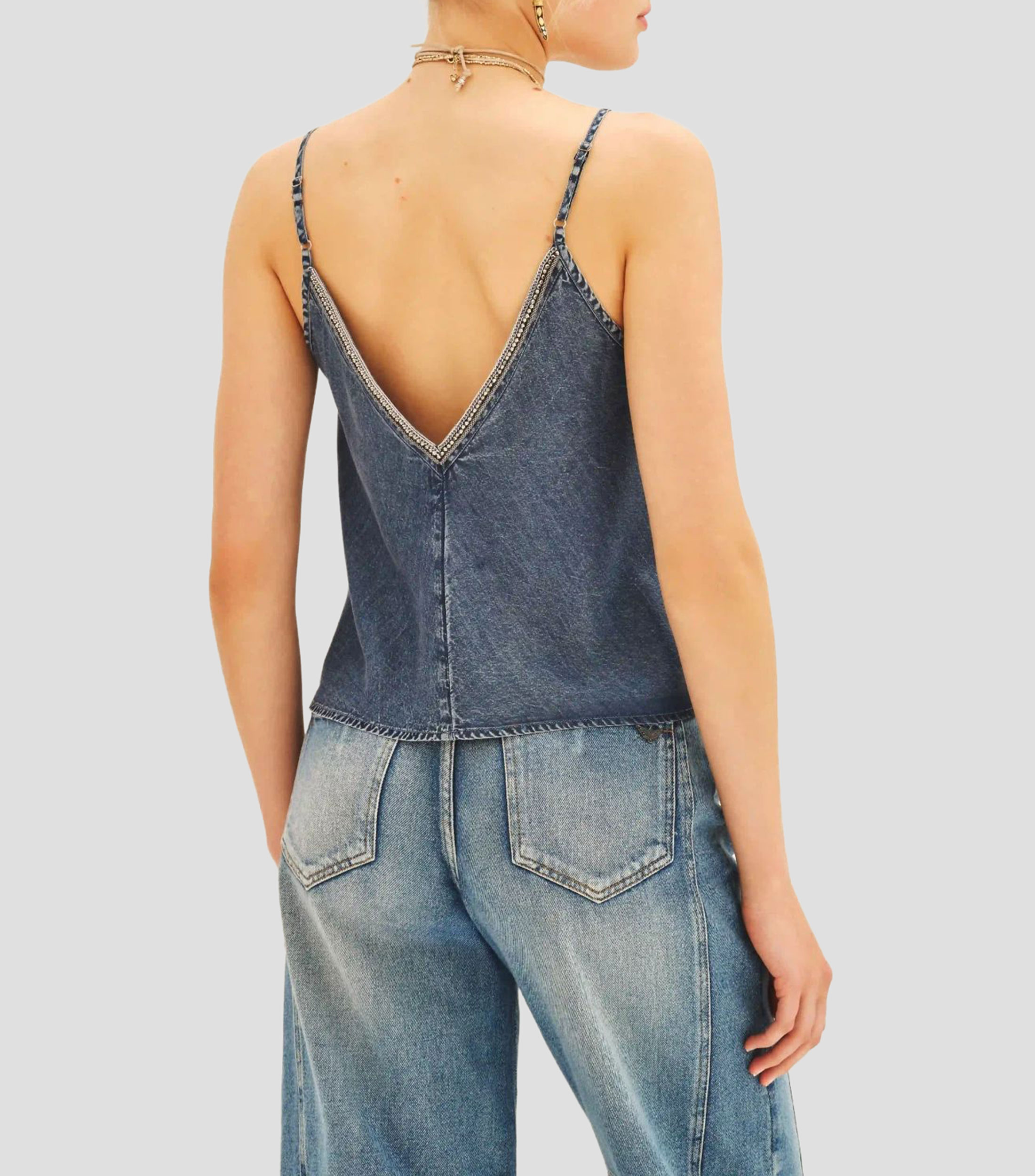 Blusa deslavada sin mangas Mujer