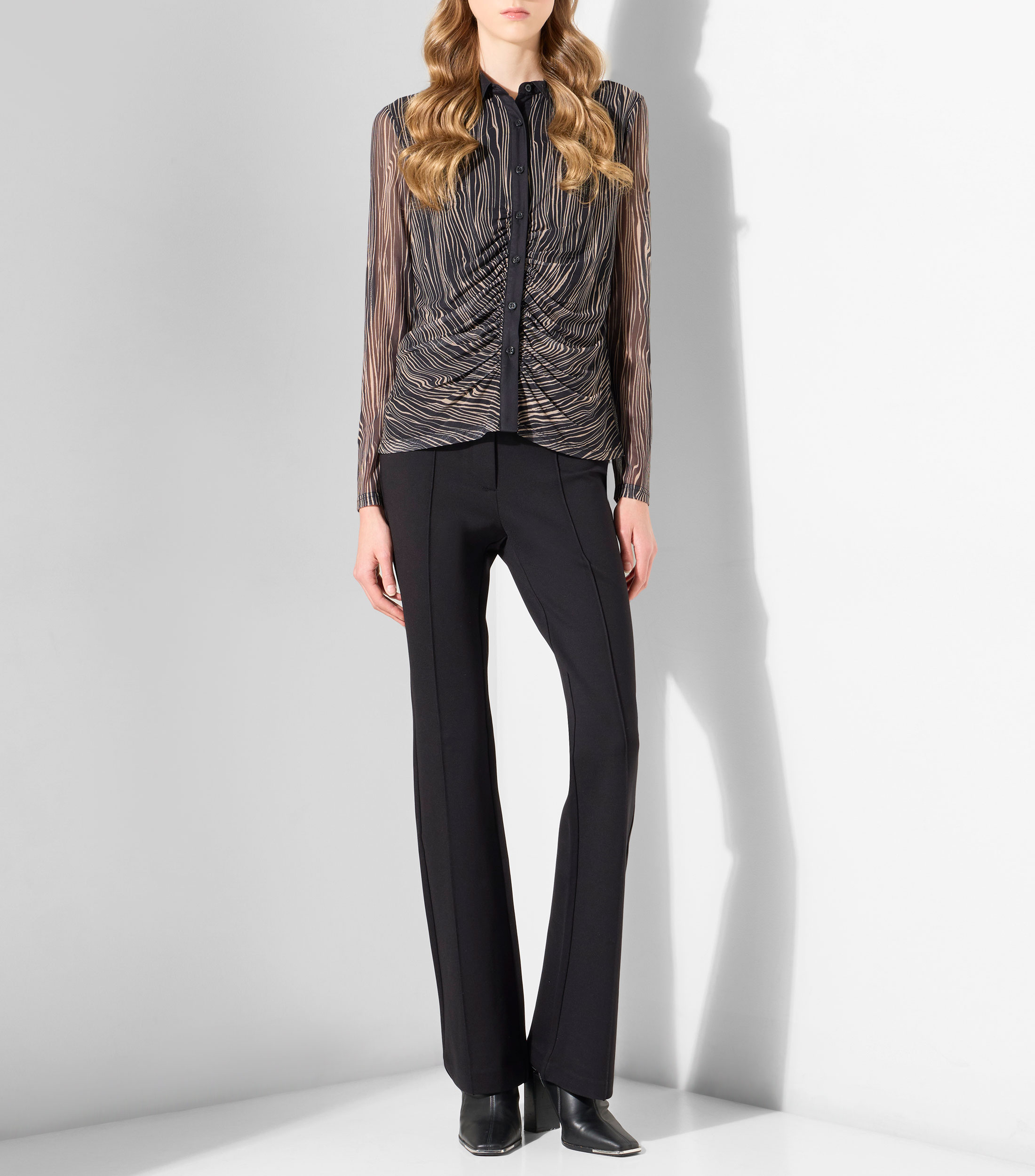 Blusa animalprint con manga larga Mujer