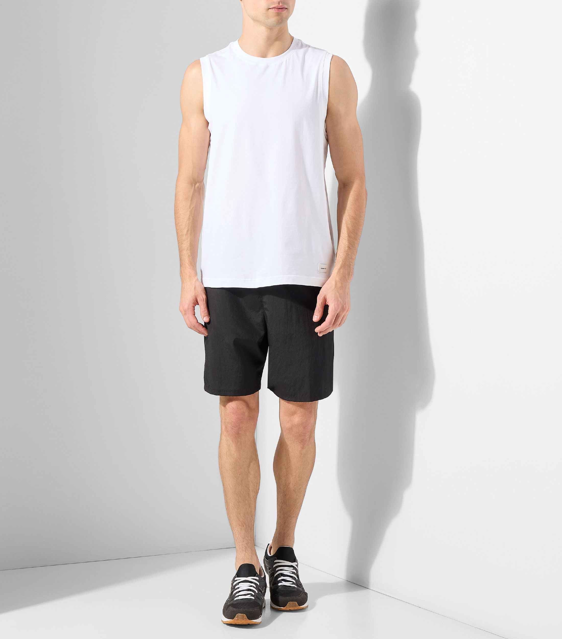 Playera para correr de cuello redondo sin mangas lisa Hombre