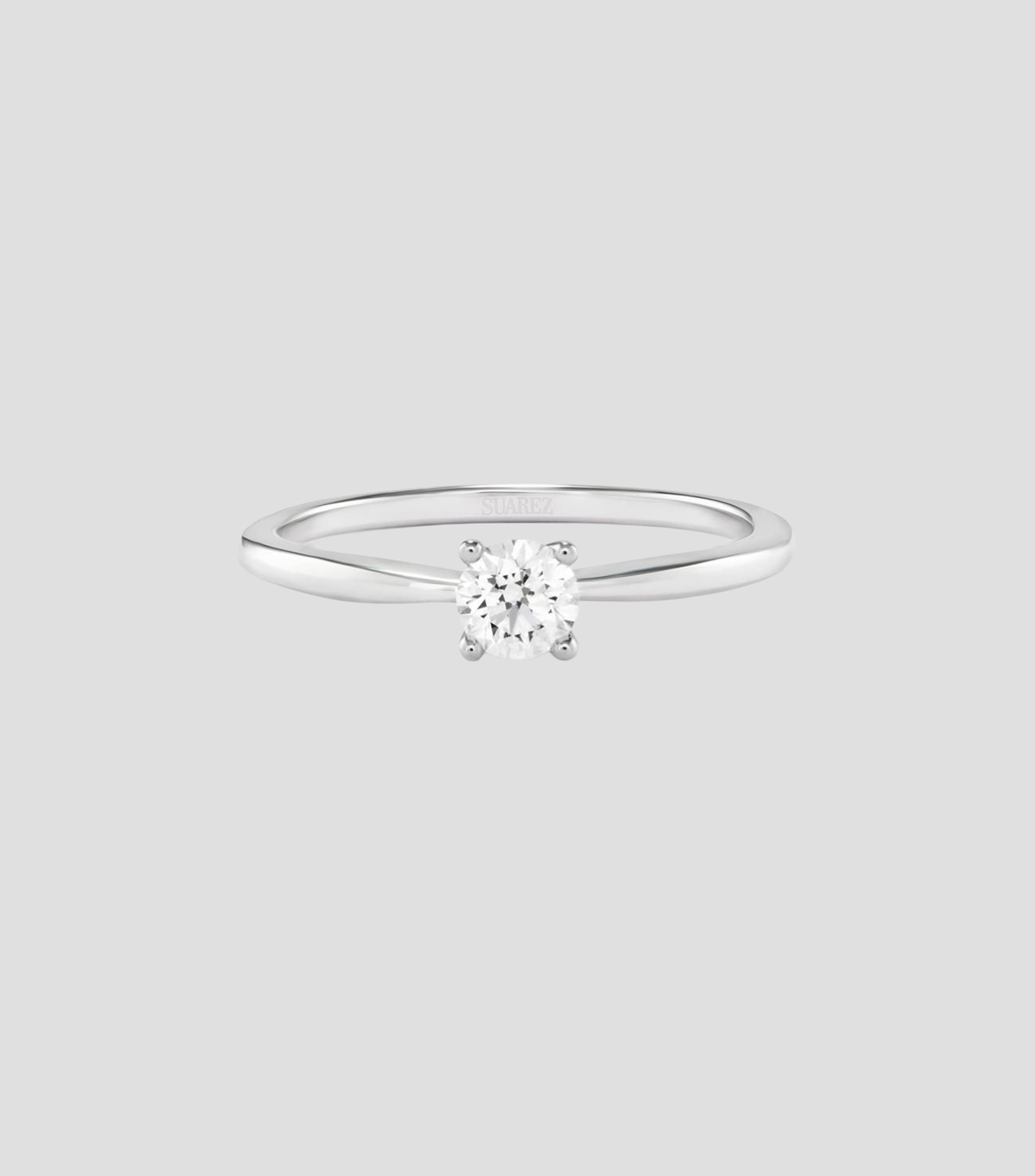 Anillo solitario en Oro blanco de 18 Kilates con diamante Mujer