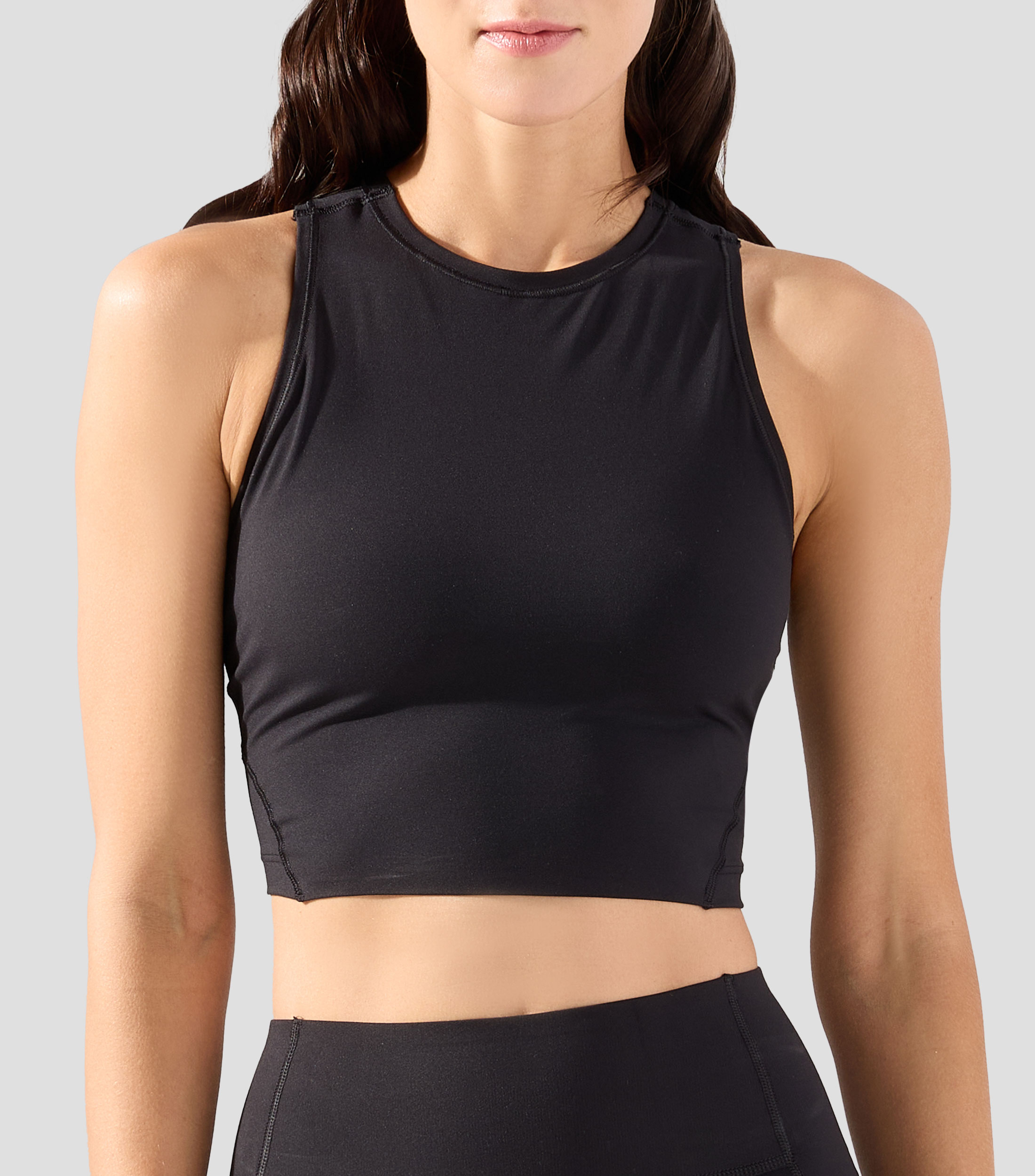 Playera para entrenamiento cuello redondo sin mangas lisa Mujer