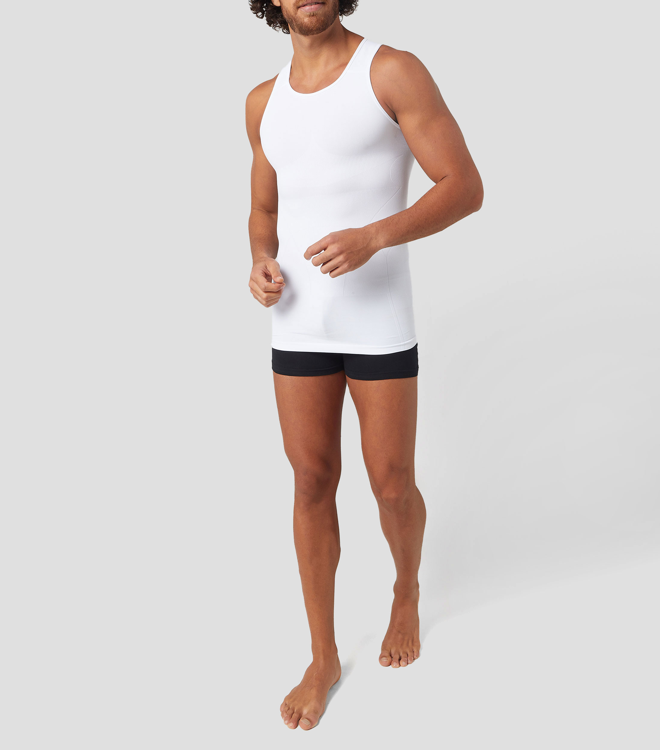 Playera interior cuello redondo sin mangas sólida Hombre