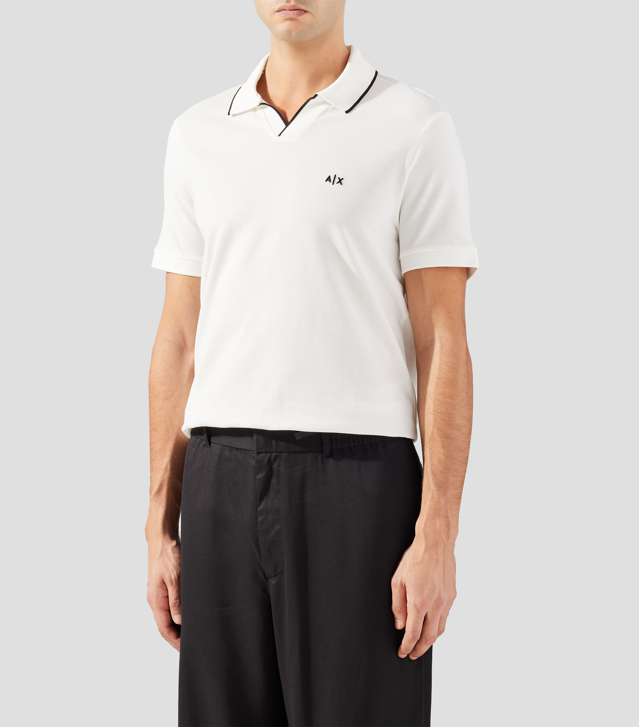 Playera tipo polo manga corta lisa Hombre