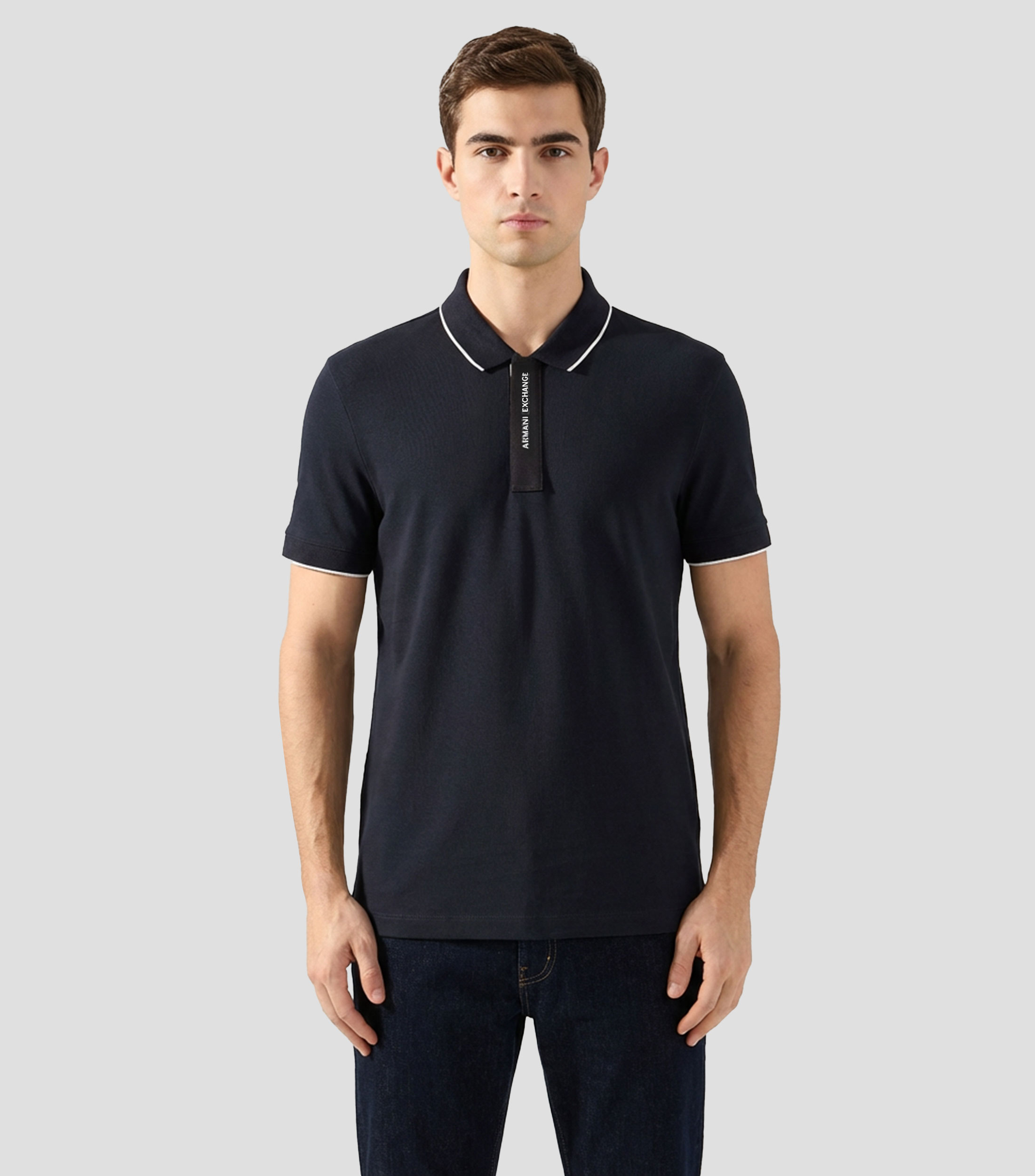 Playera tipo polo con manga corta lisa Hombre