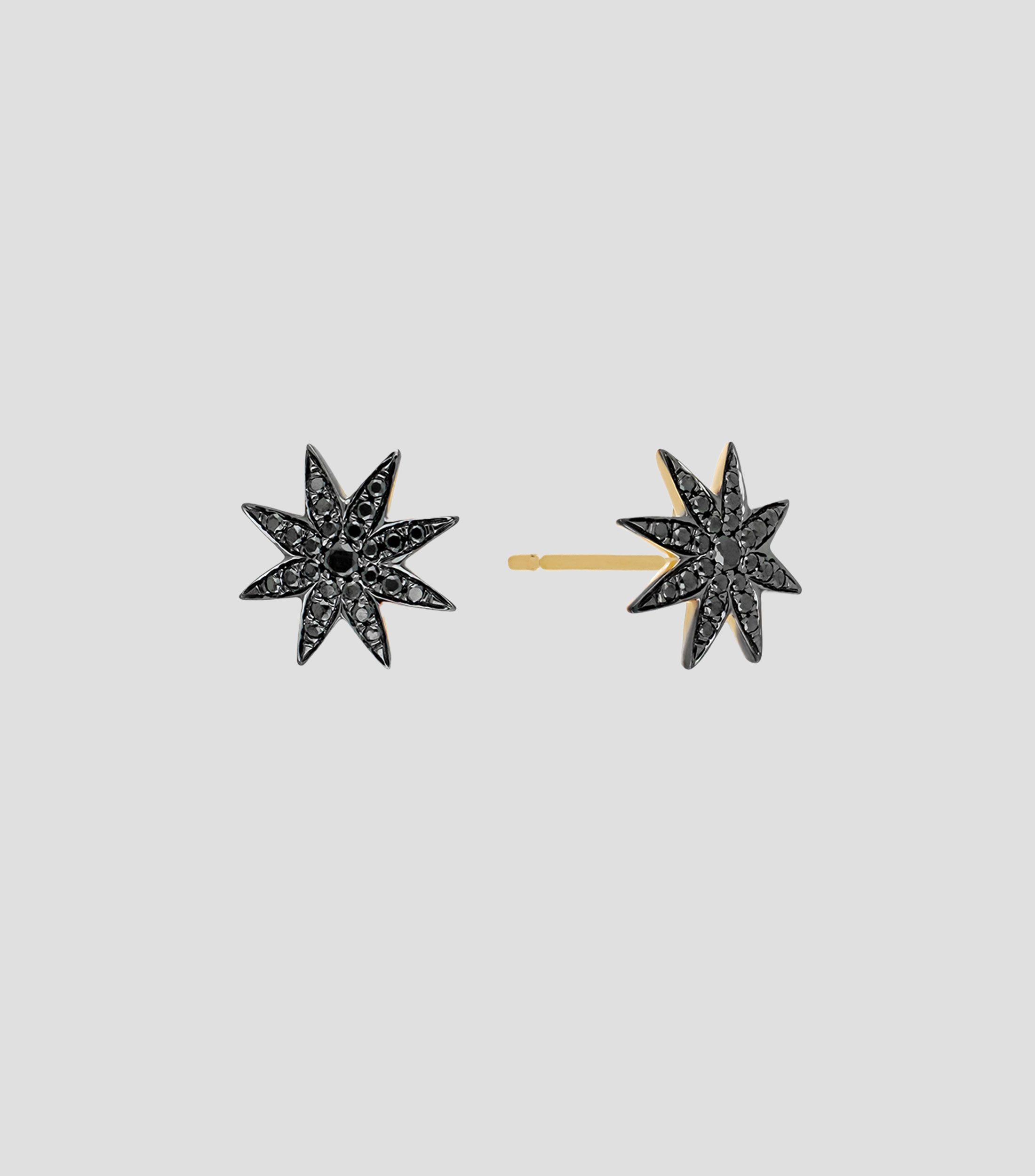 Broqueles estrella oxidada con diamantes negros Mujer