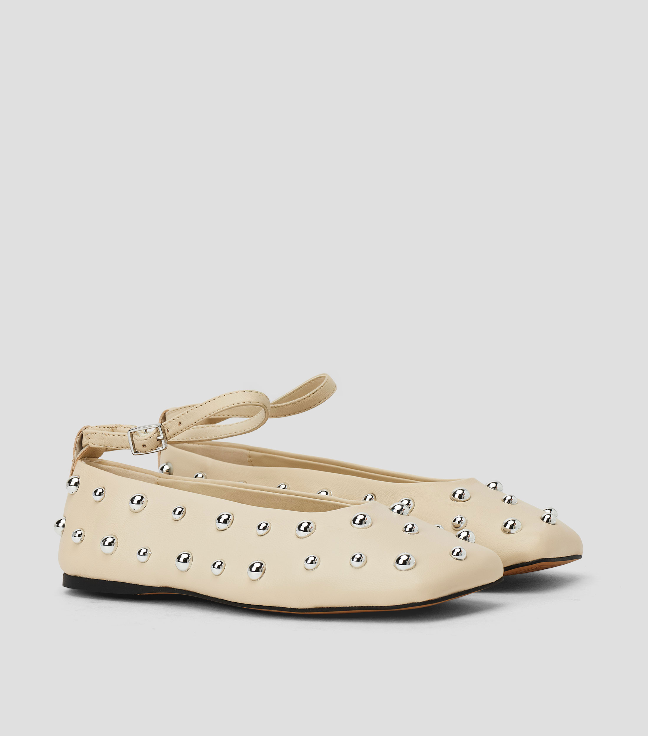 Flats en piel con adornos Mujer