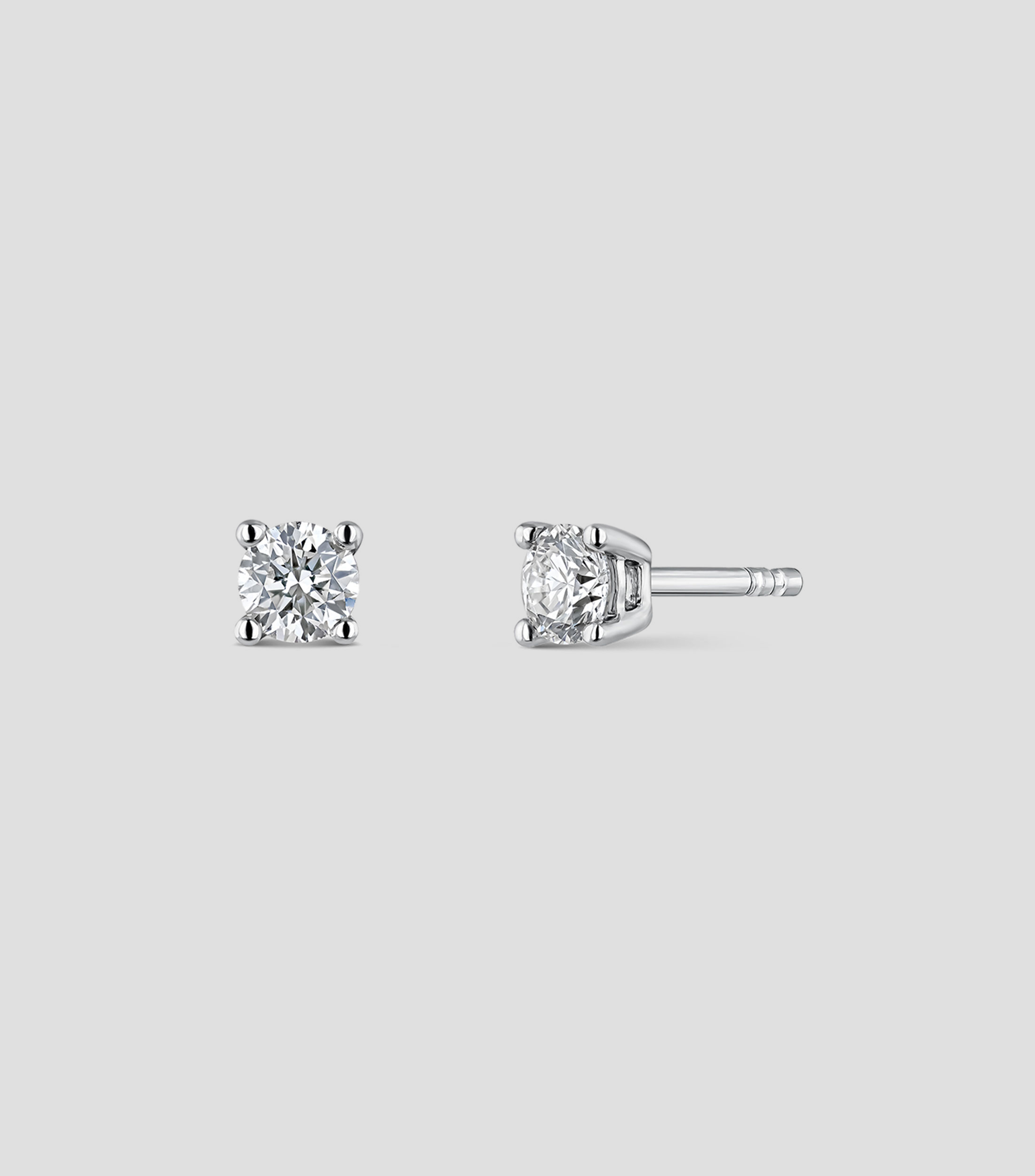 Aretes Solitario de Oro Blanco de 18 Kilates con Diamante Mujer