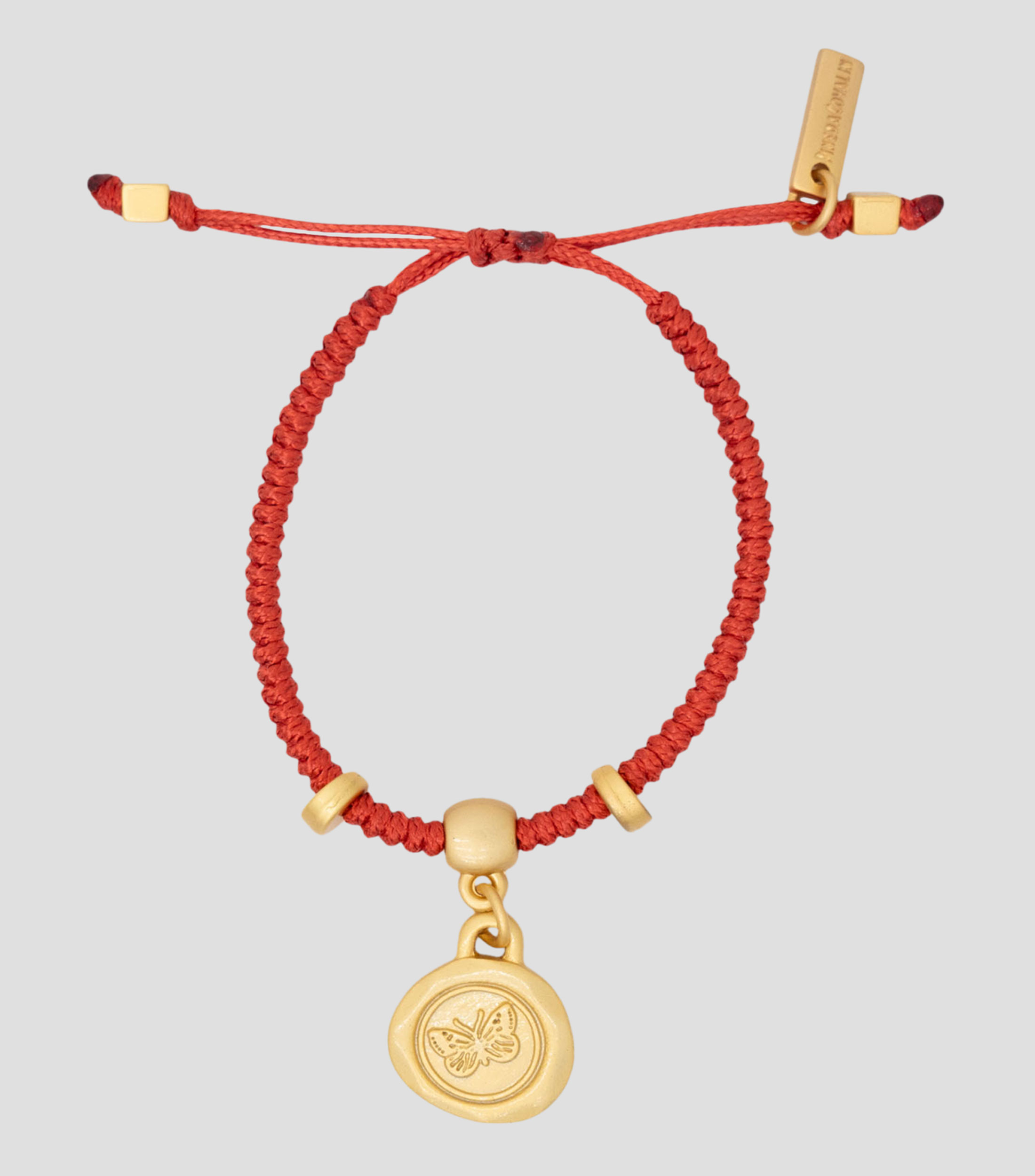 Brazalete rojo con dije de mariposa Mujer