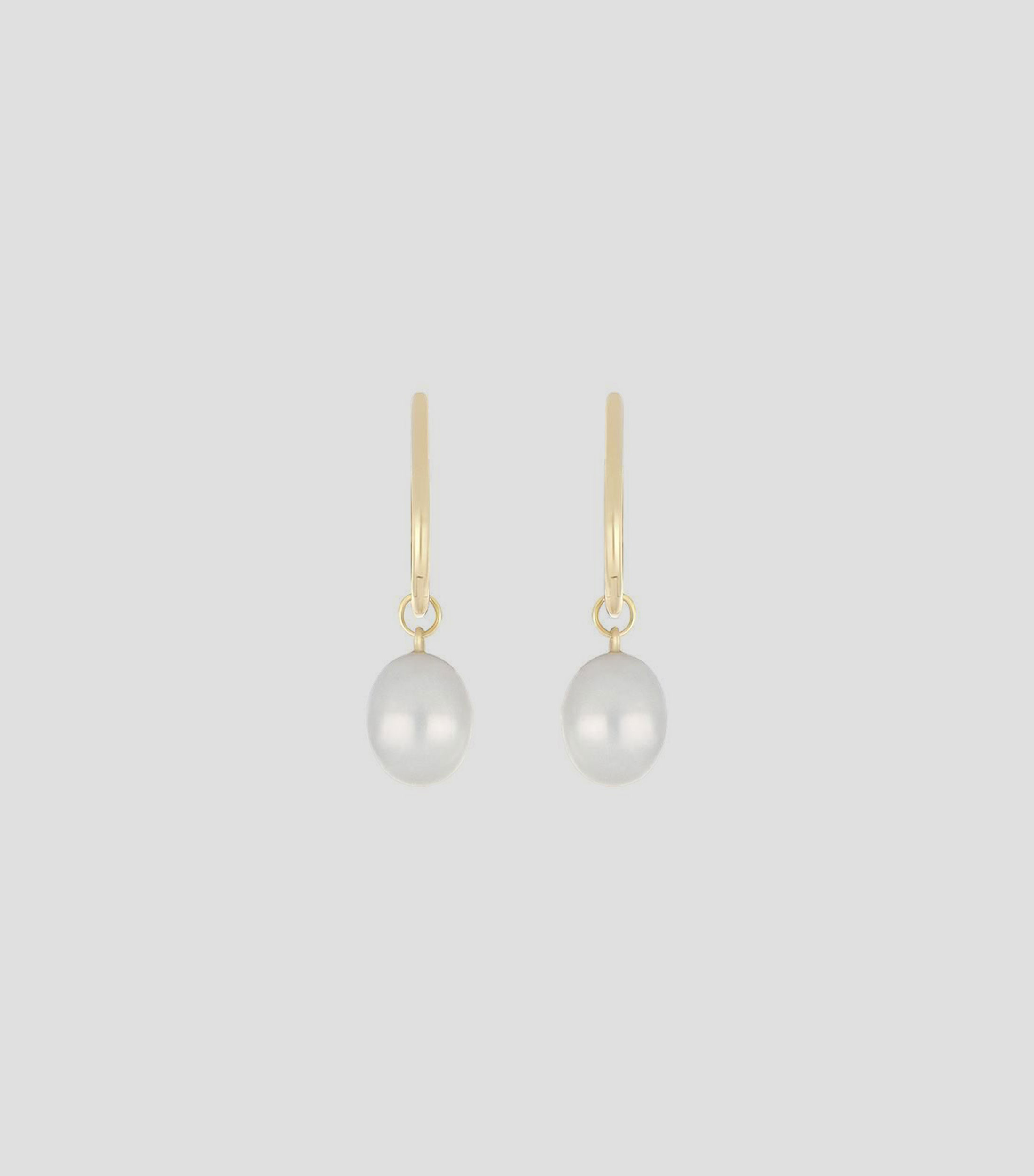 Aretes en oro amarillo 18 kilates con perla Mujer