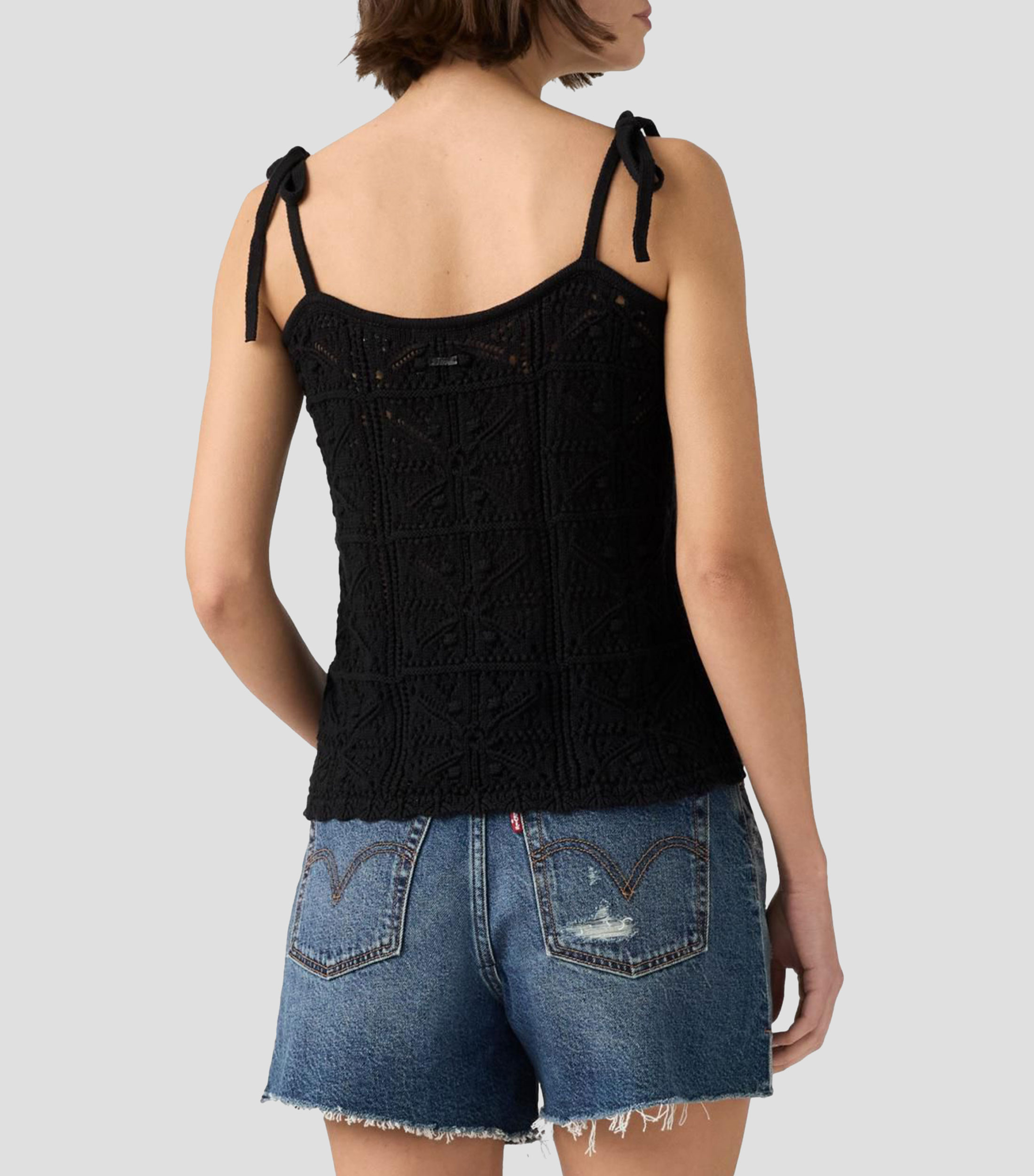 Blusa lisa sin mangas Mujer