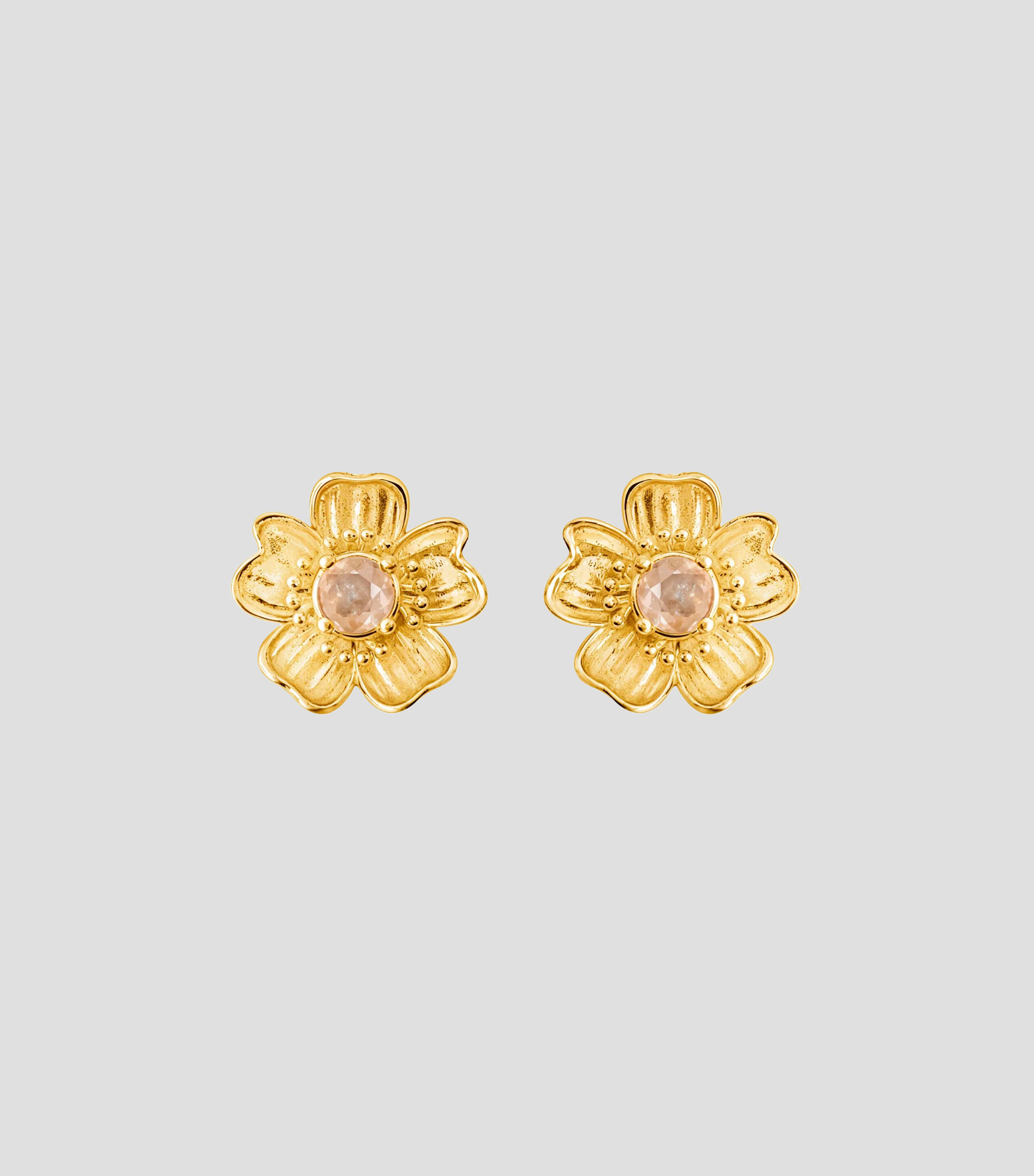 Broqueles de flor con topacio Mujer
