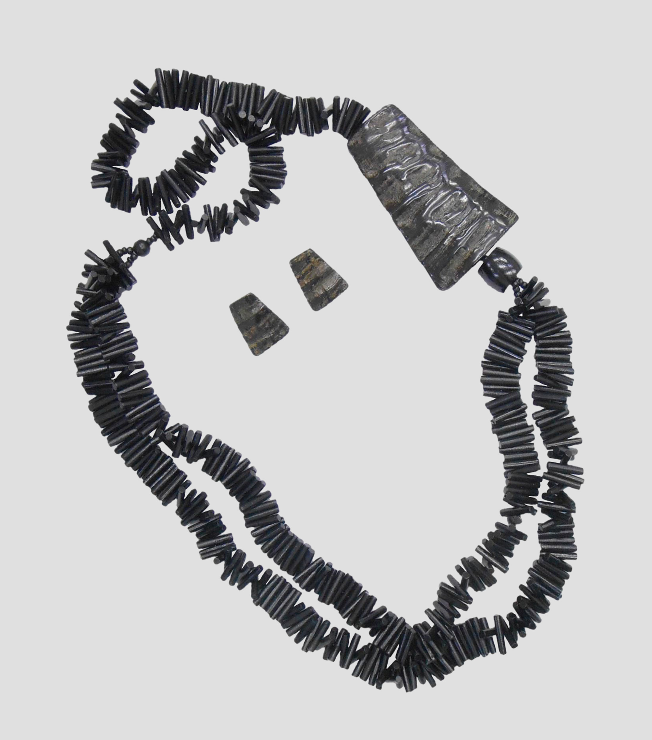 Set collar y aretes Mujer