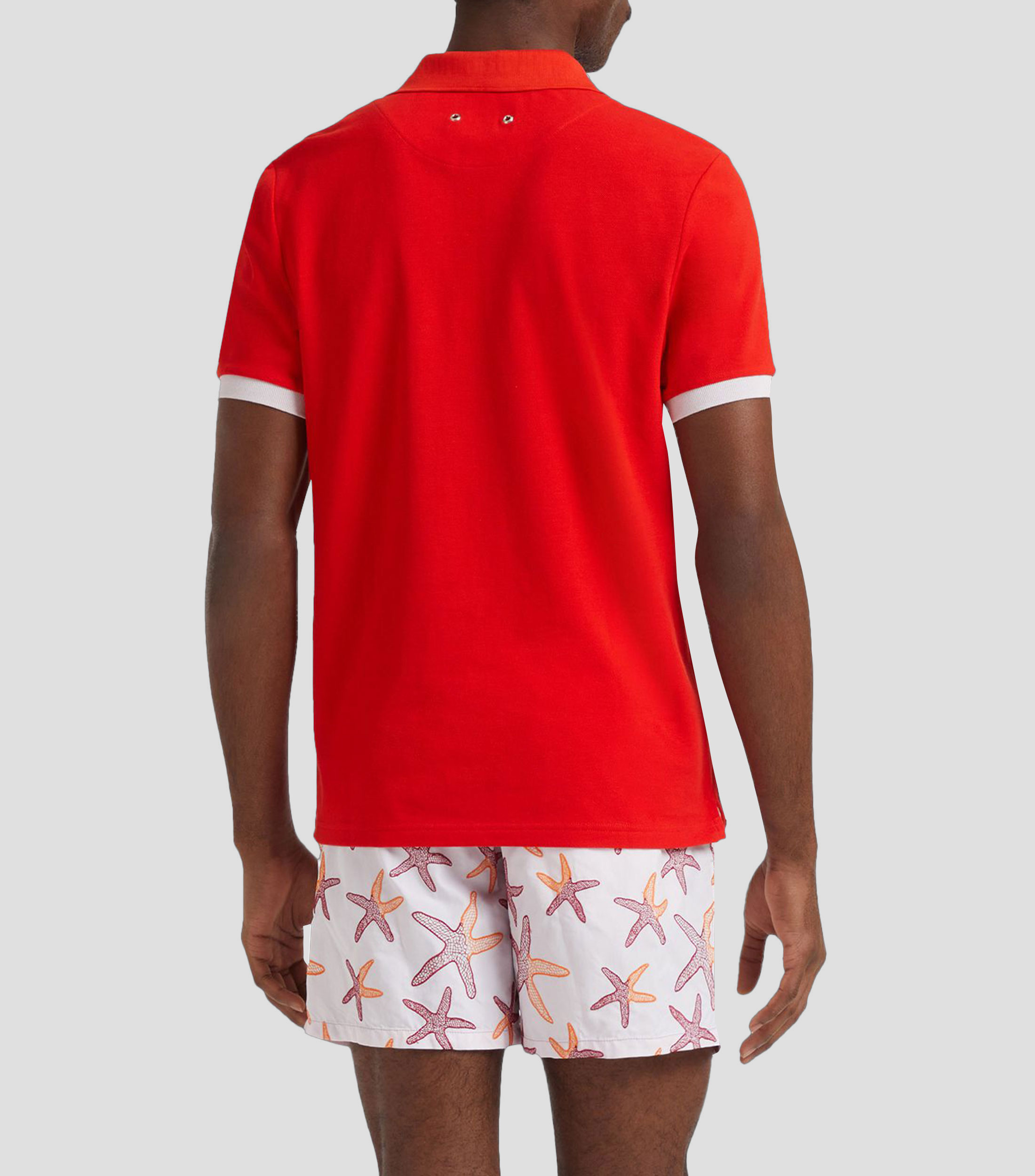Playera tipo polo con manga corta lisa Hombre