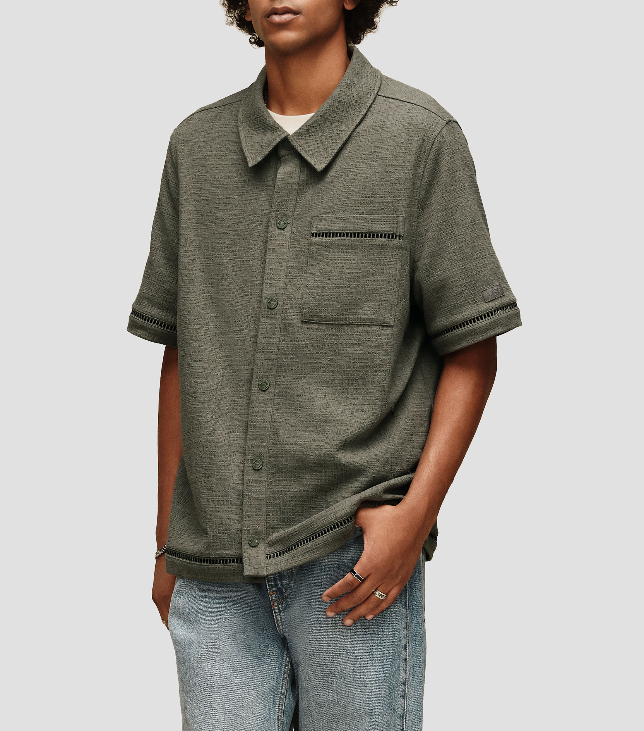 Playera de cuello camisero con manga corta lisa Hombre