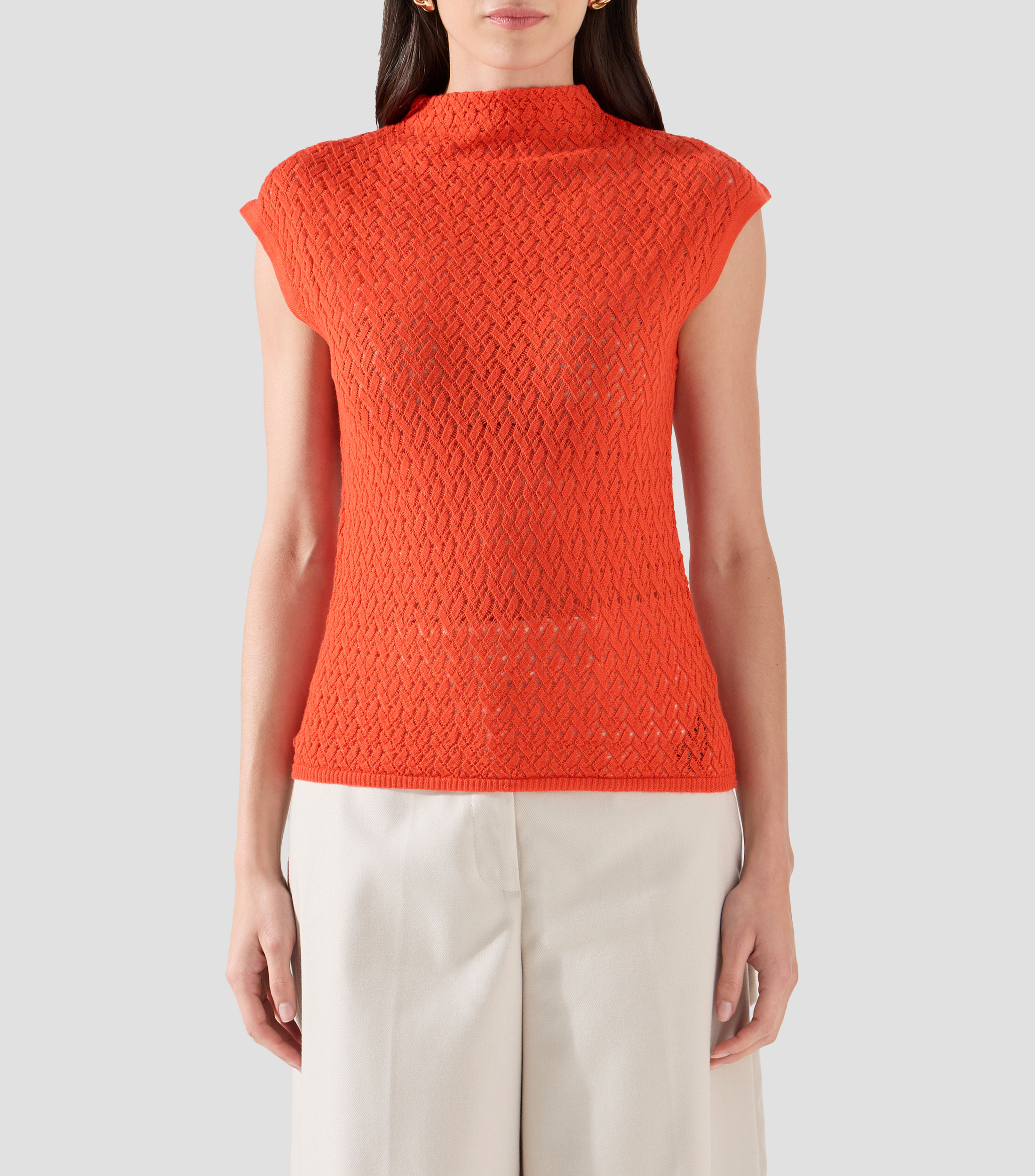Blusa lisa sin mangas Mujer
