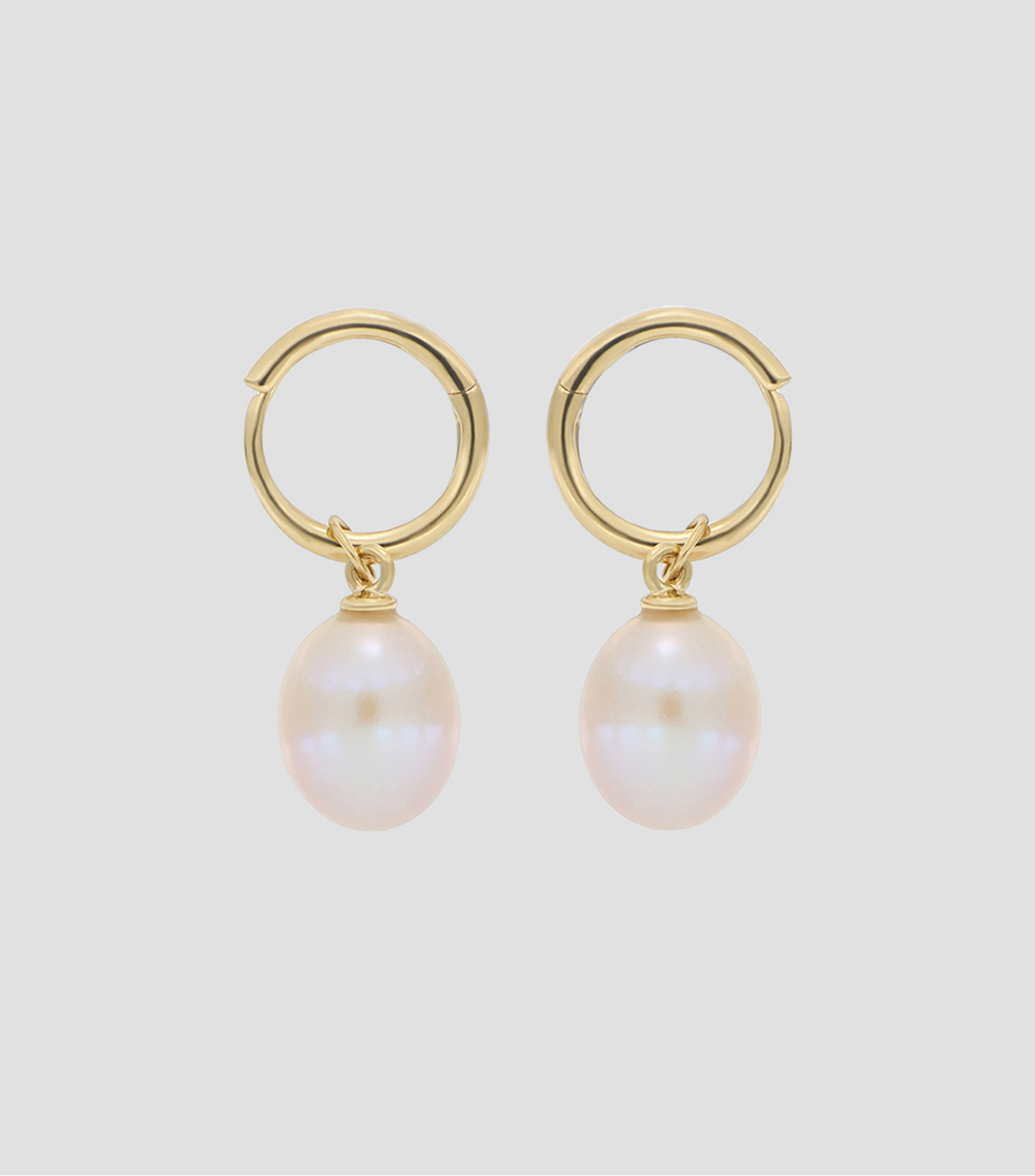 Aretes en oro amarillo 18 kilates con perla Mujer