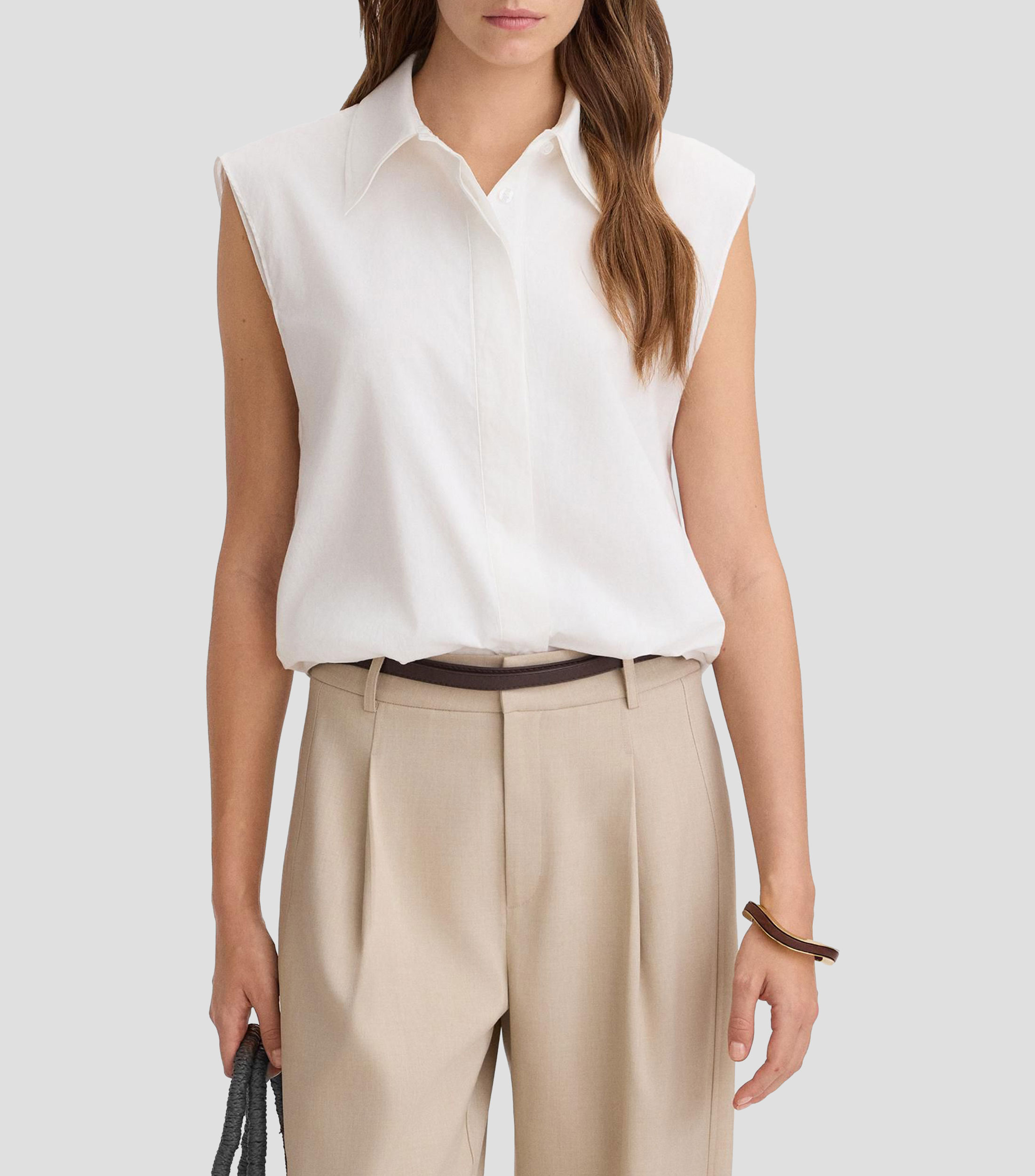 Blusa lisa sin mangas Mujer