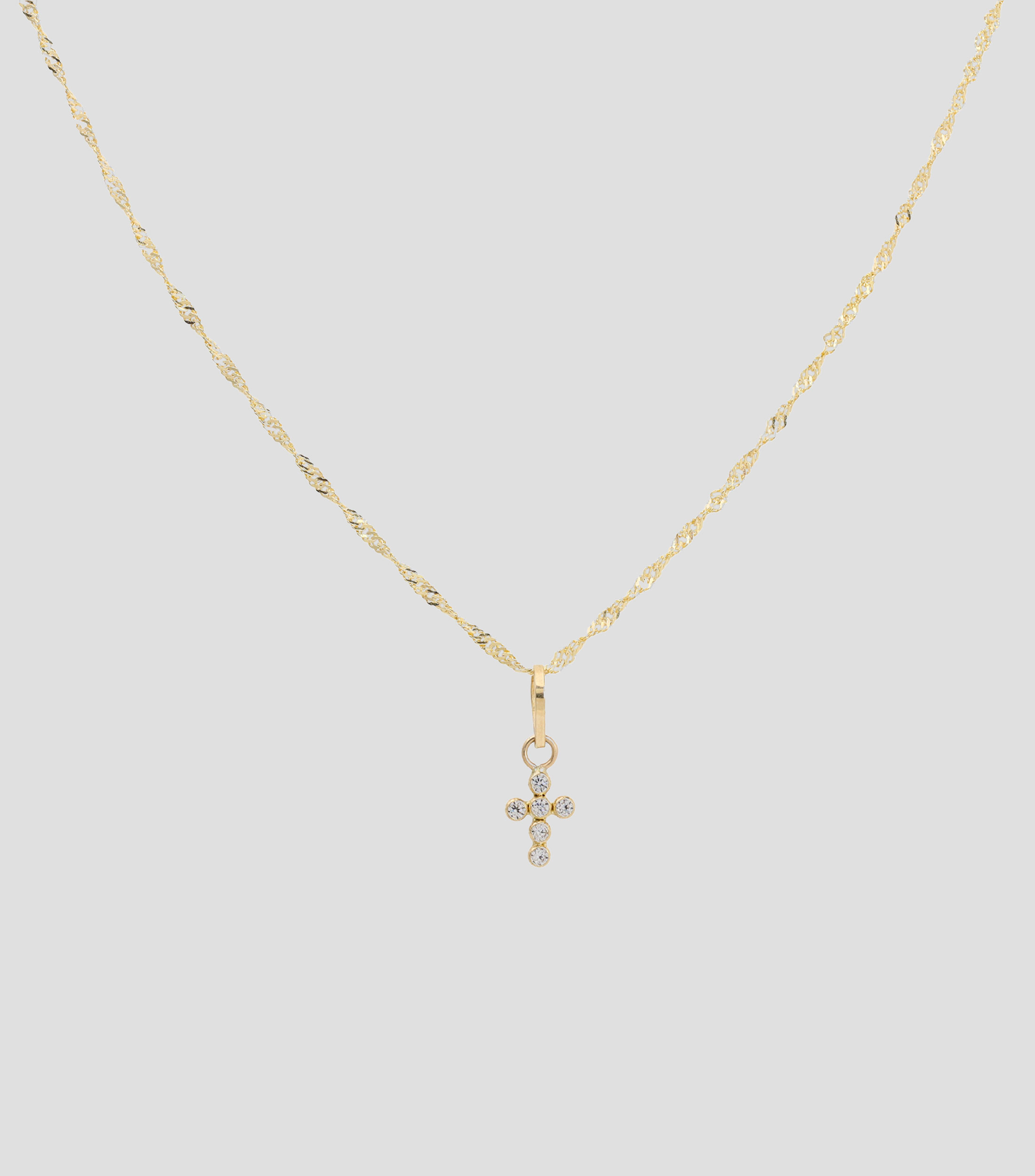 Dije de cruz en oro con zirconia Bebé