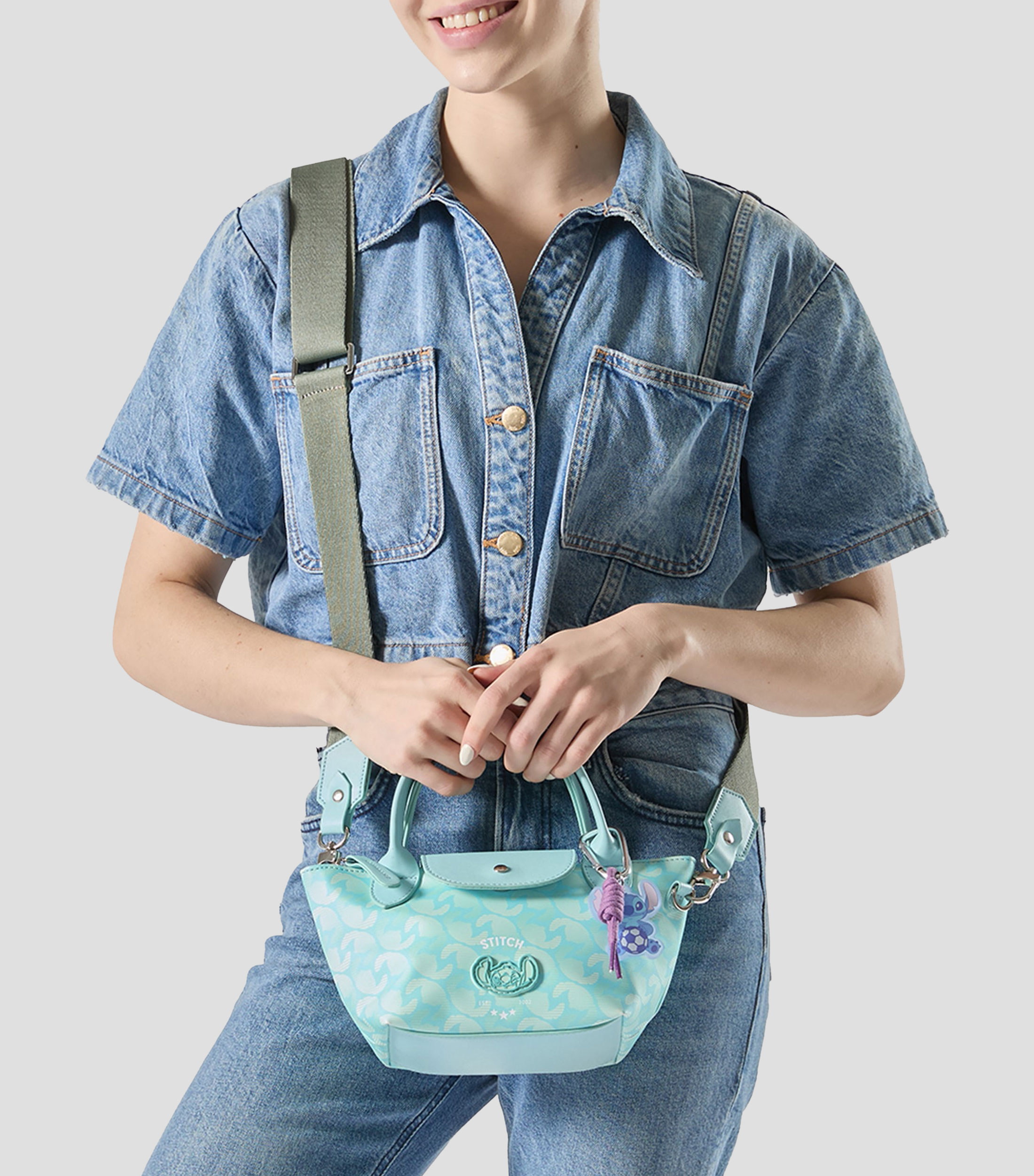 Bolsa crossbody verde Stitch Mundial estampada Mujer