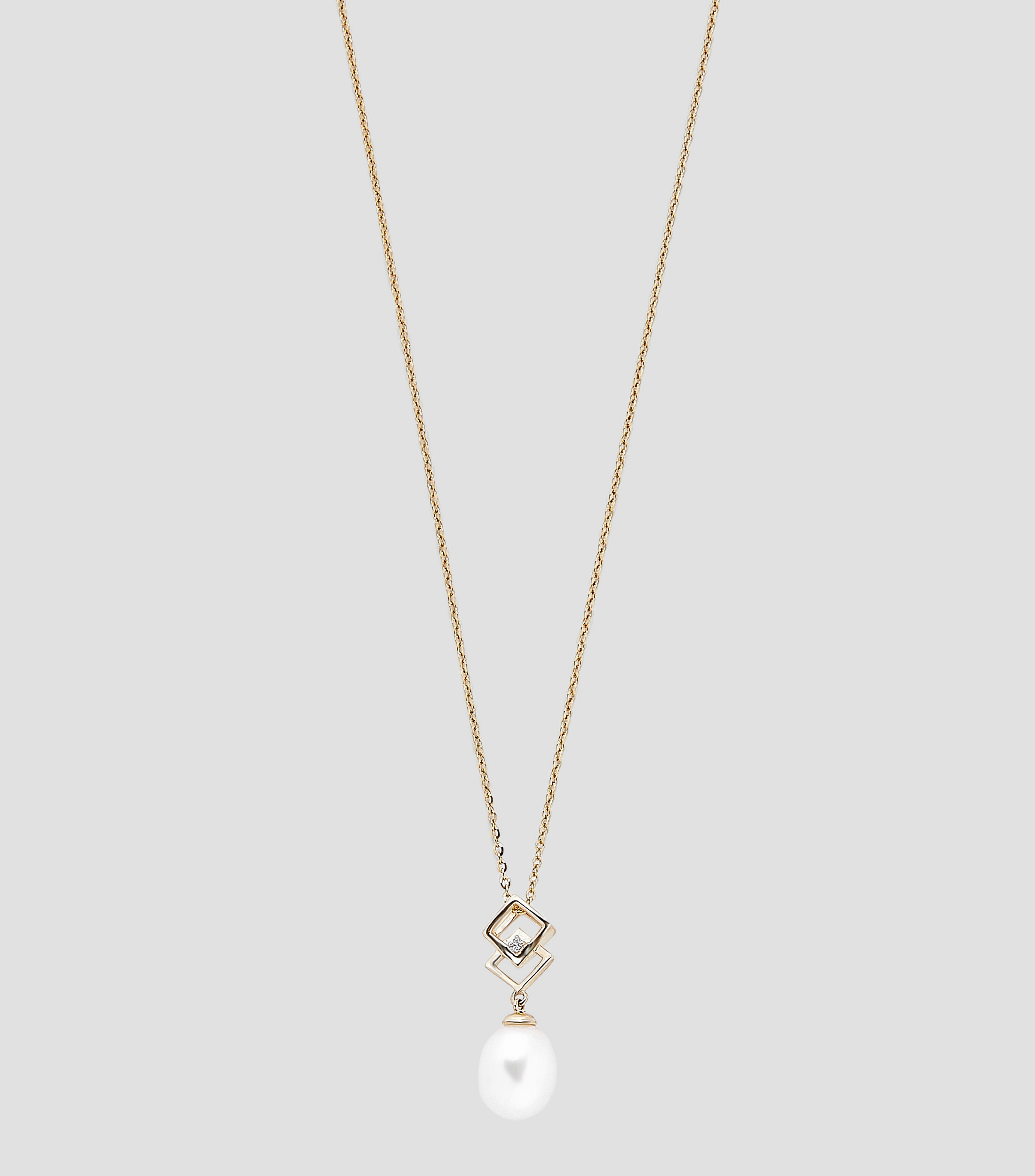 Dije de perlas con cadena en oro amarillo de 14 kilates Mujer