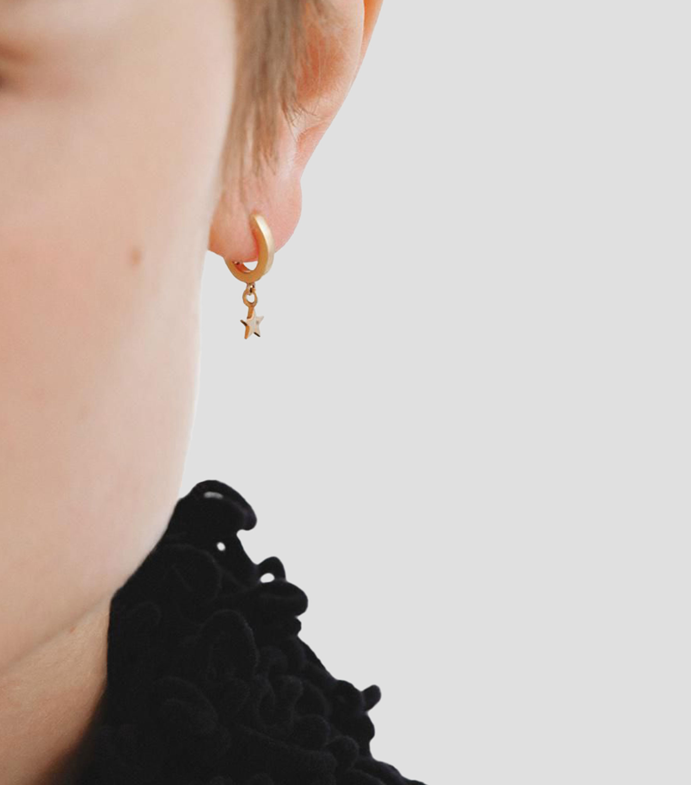 Pendientes de aro pequeño en plata .925 con estrella Mini Elua Mujer