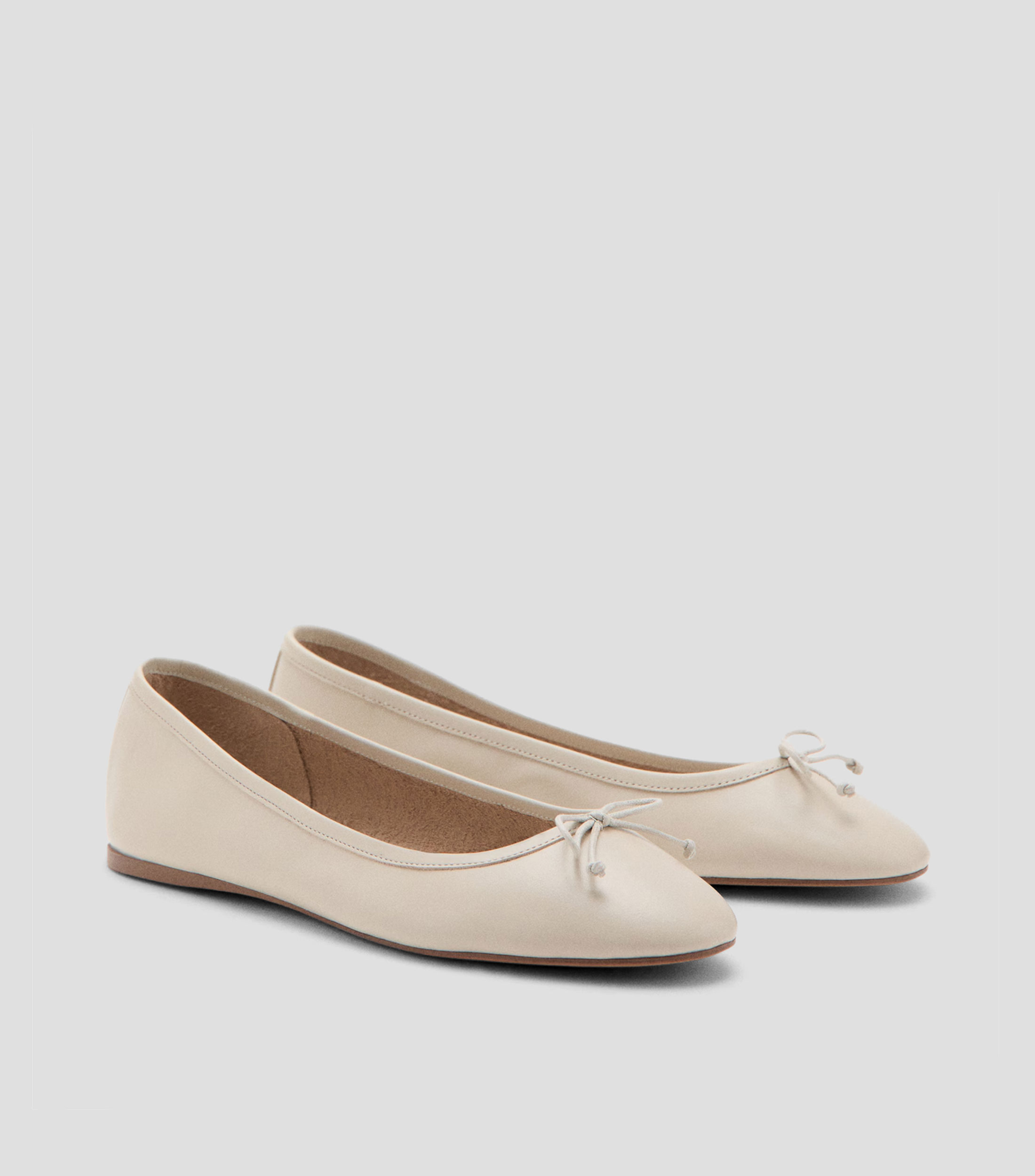Flats en piel con lazo Mujer