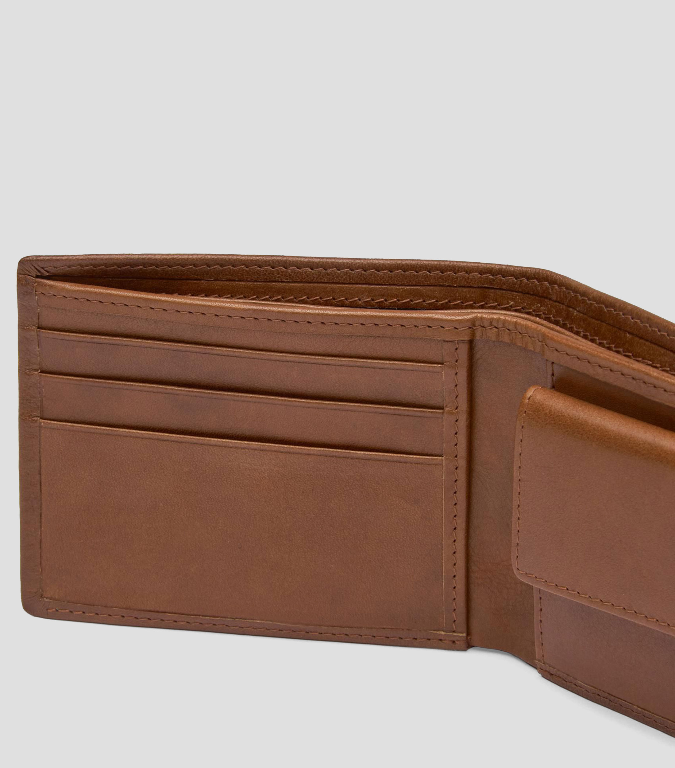 Cartera bifold en piel con elástico lisa Hombre
