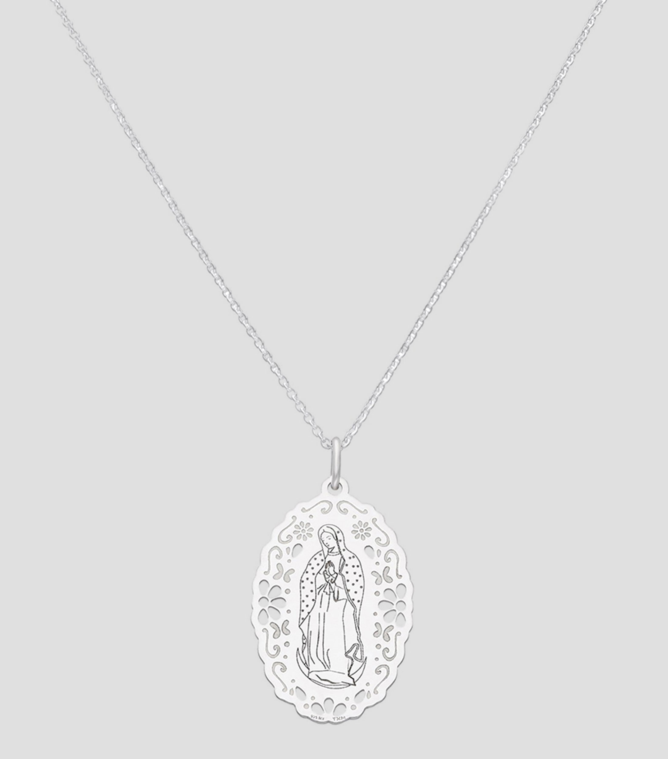Dije en plata Mujer