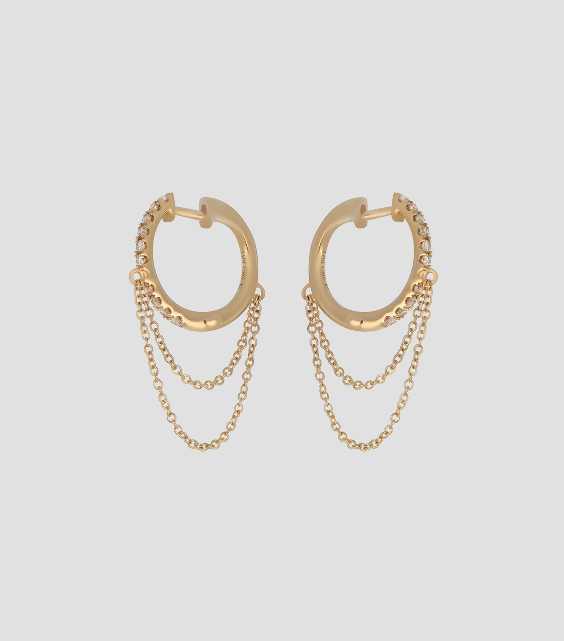 Aretes en oro de 18 kilates con diamantes Mujer