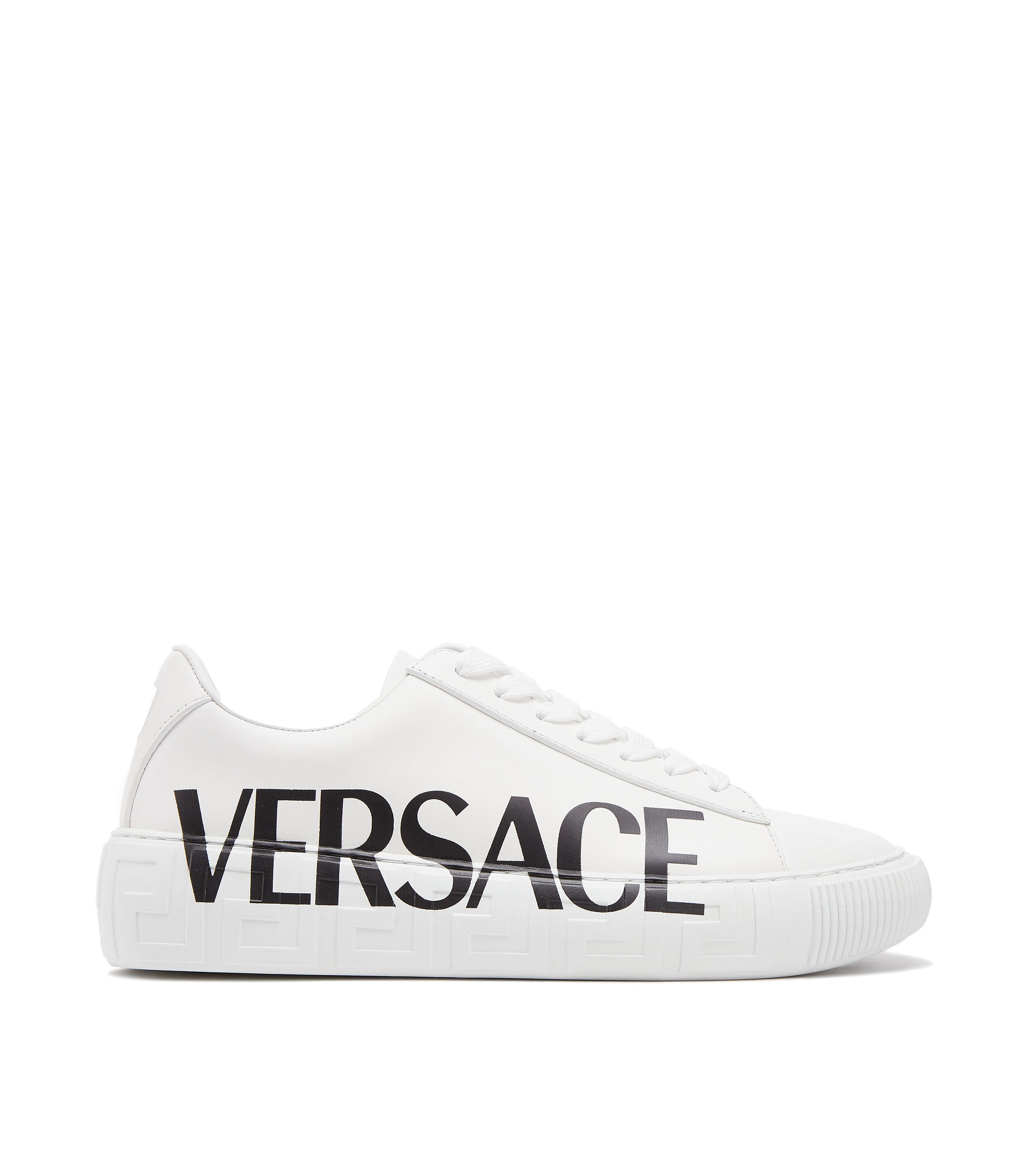 Versace: Tenis casuales con Vitello Scritta piel blancos Hombre | El Palacio de Hierro