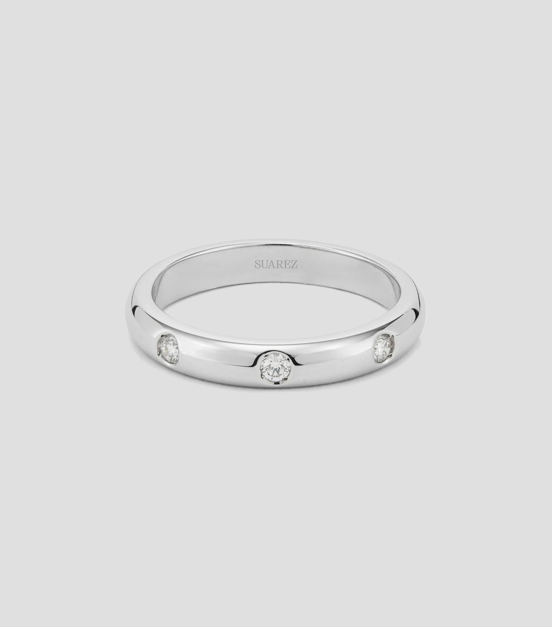 Anillo en Oro blanco de 18 Kilates con 3 diamantes en talla brillante Mujer
