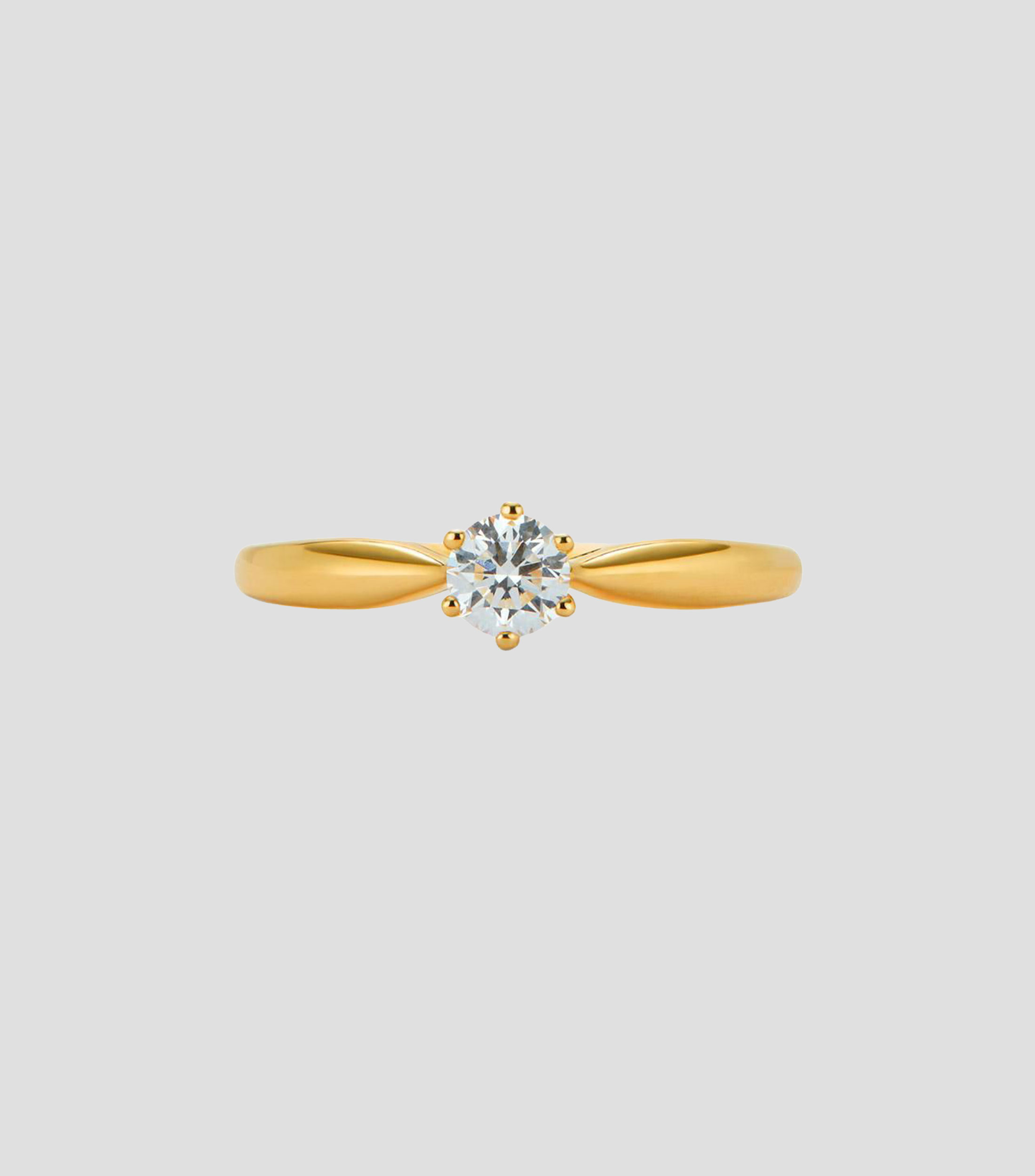 Anillo solitario en Oro amarillo de 18 Kilates con diamante Mujer